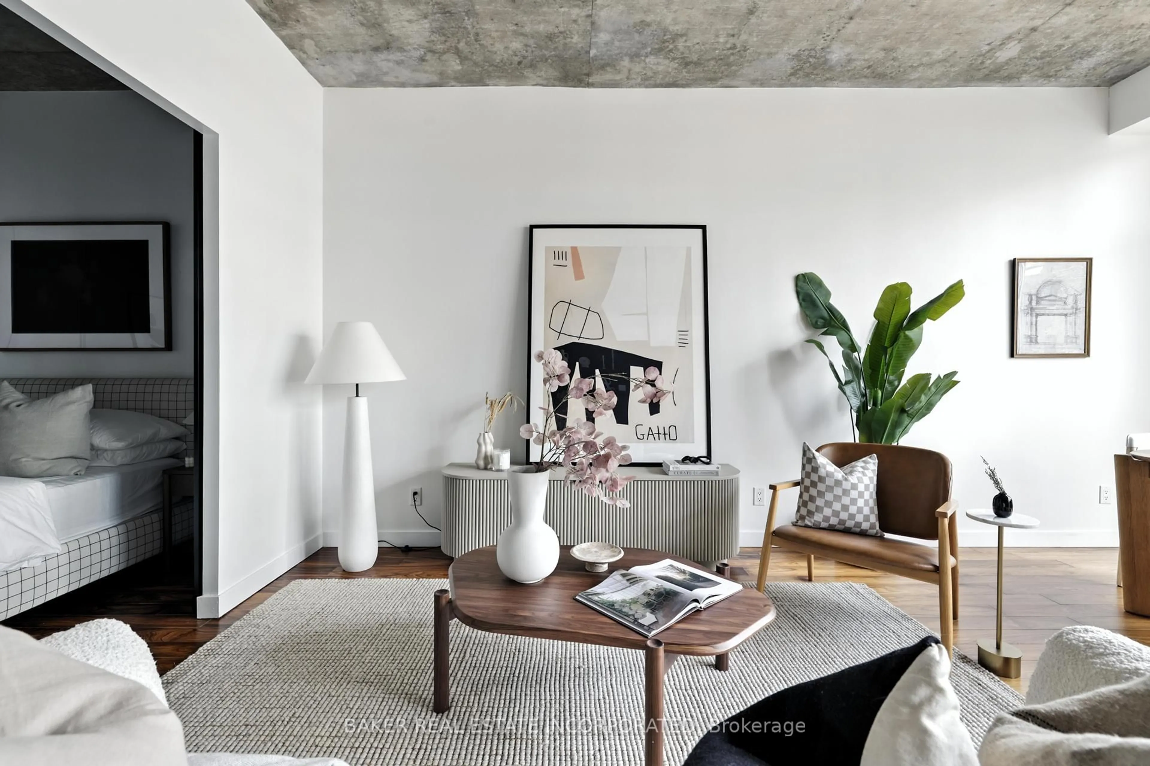 Living room with furniture, cement floor for 23 Brant St #601, Toronto Ontario M5V 2L5