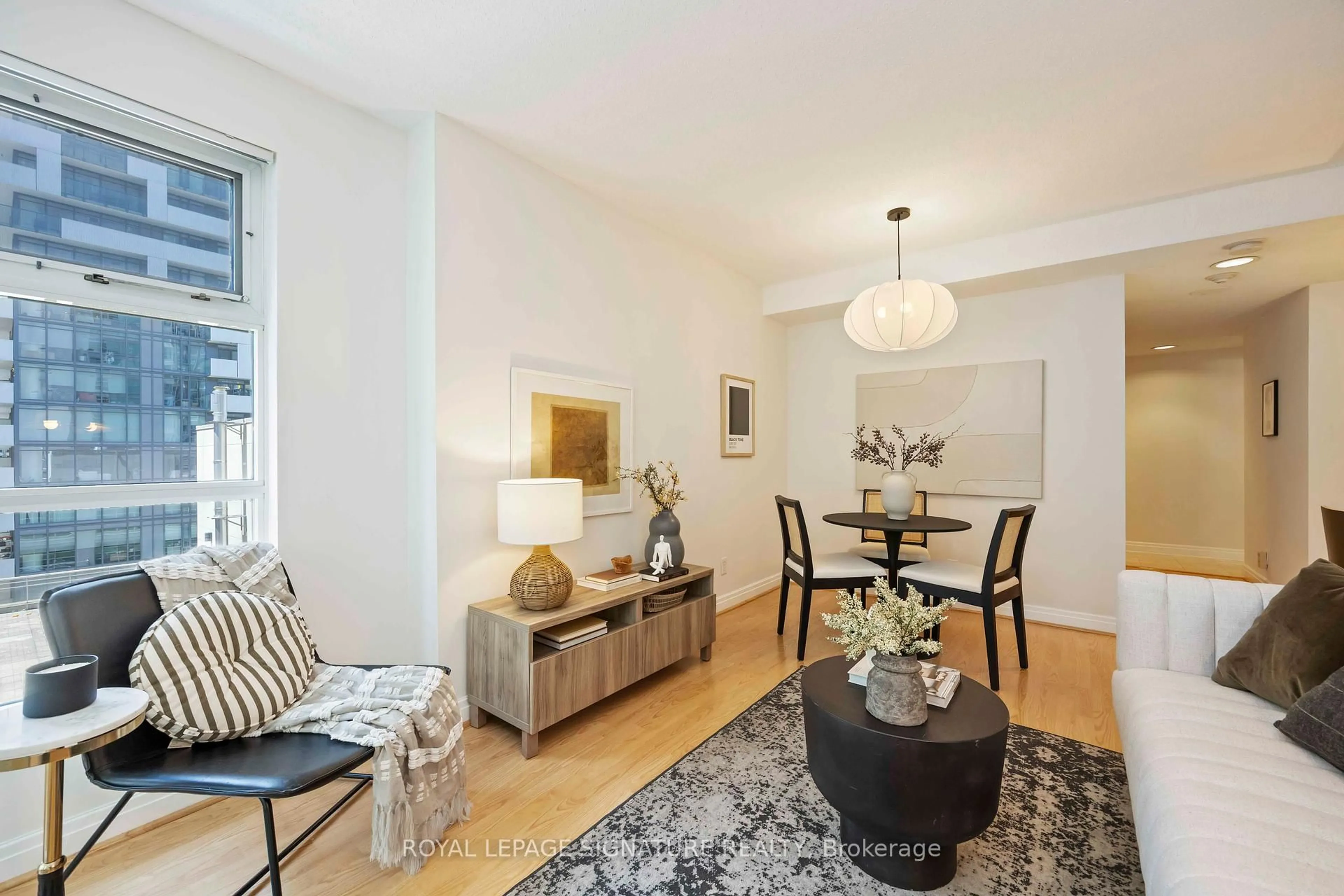 Living room with furniture, unknown for 50 Lombard St #1204, Toronto Ontario M5C 2X4
