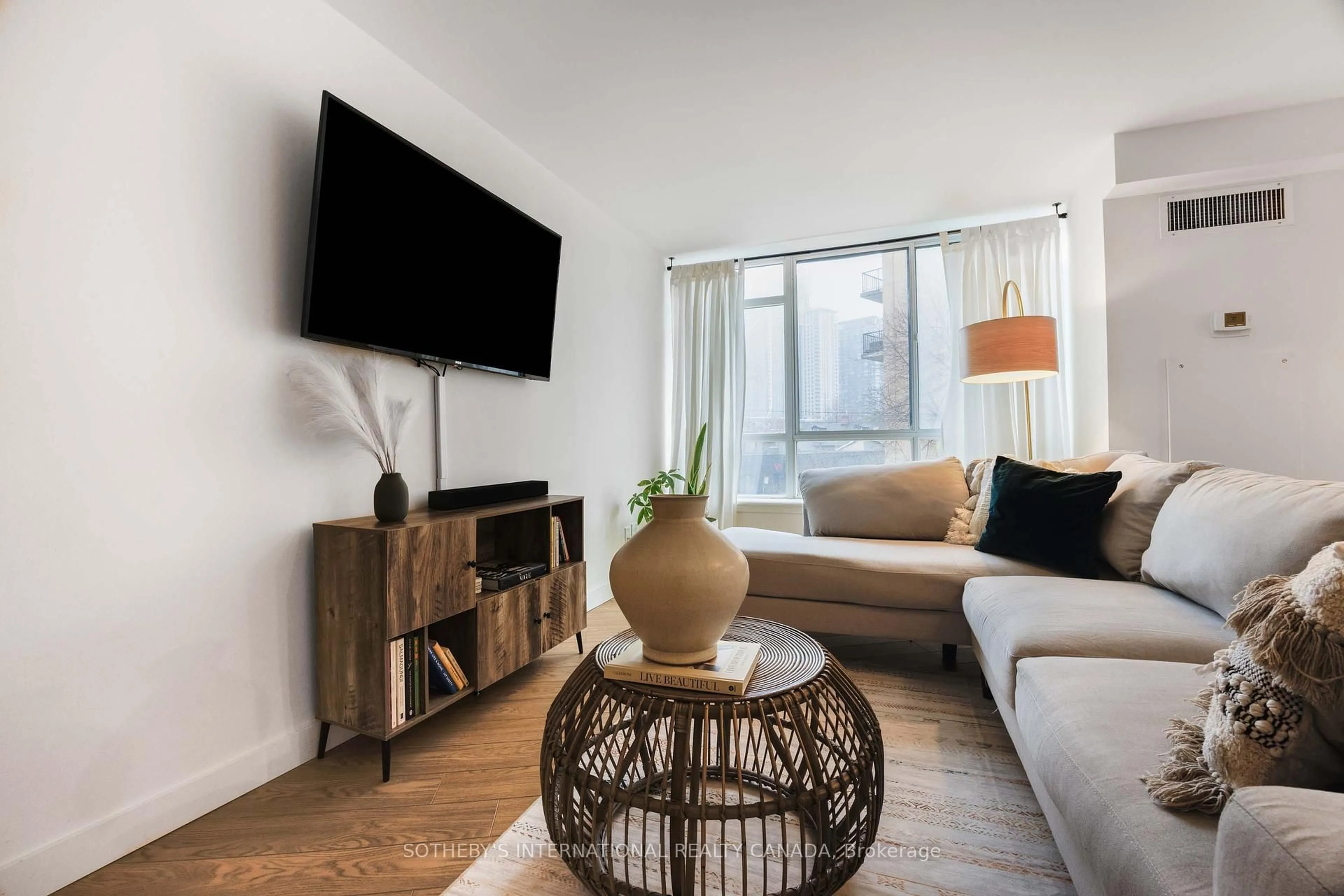 Living room with furniture, unknown for 801 King St #213, Toronto Ontario M5V 3C9