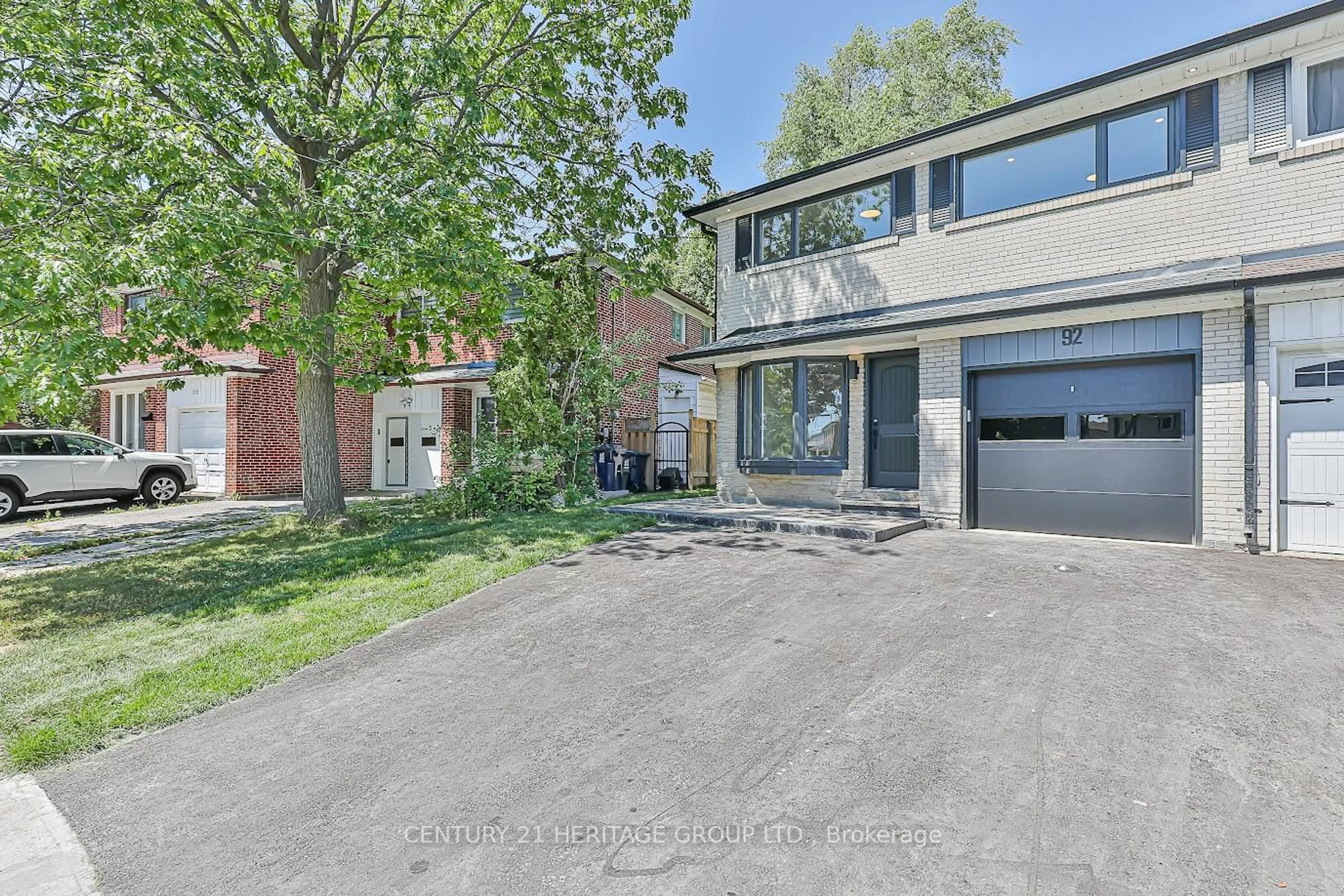 Home with brick exterior material, street for 92 Tanjoe Cres, Toronto Ontario M2M 1P7