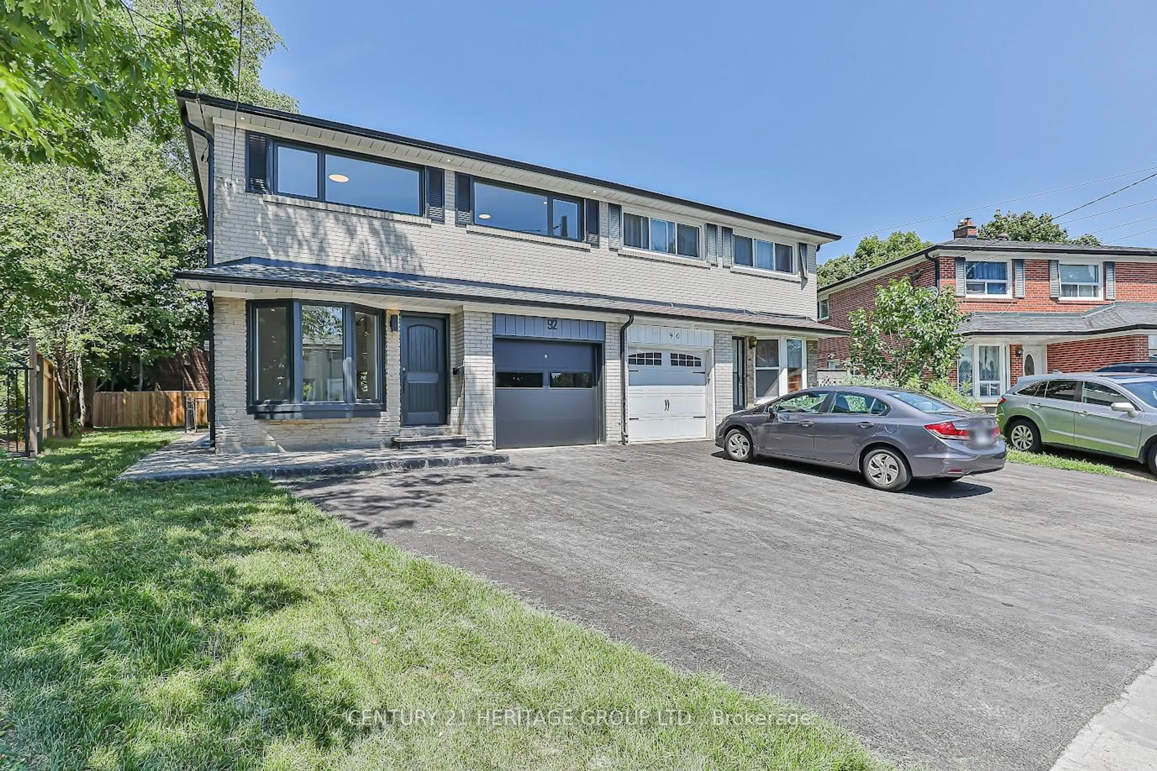 Home with brick exterior material, street for 92 Tanjoe Cres, Toronto Ontario M2M 1P7