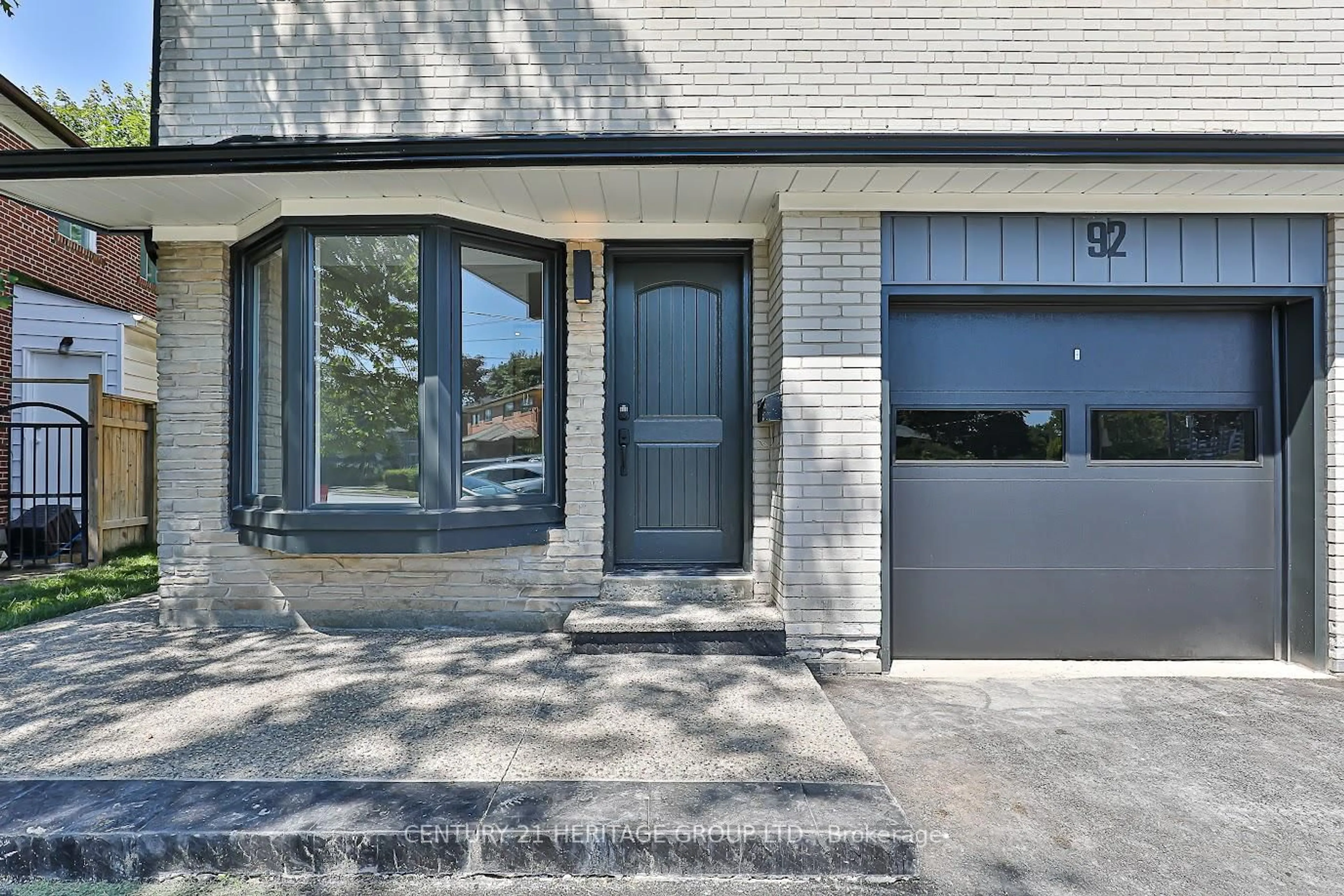 Home with brick exterior material, street for 92 Tanjoe Cres, Toronto Ontario M2M 1P7