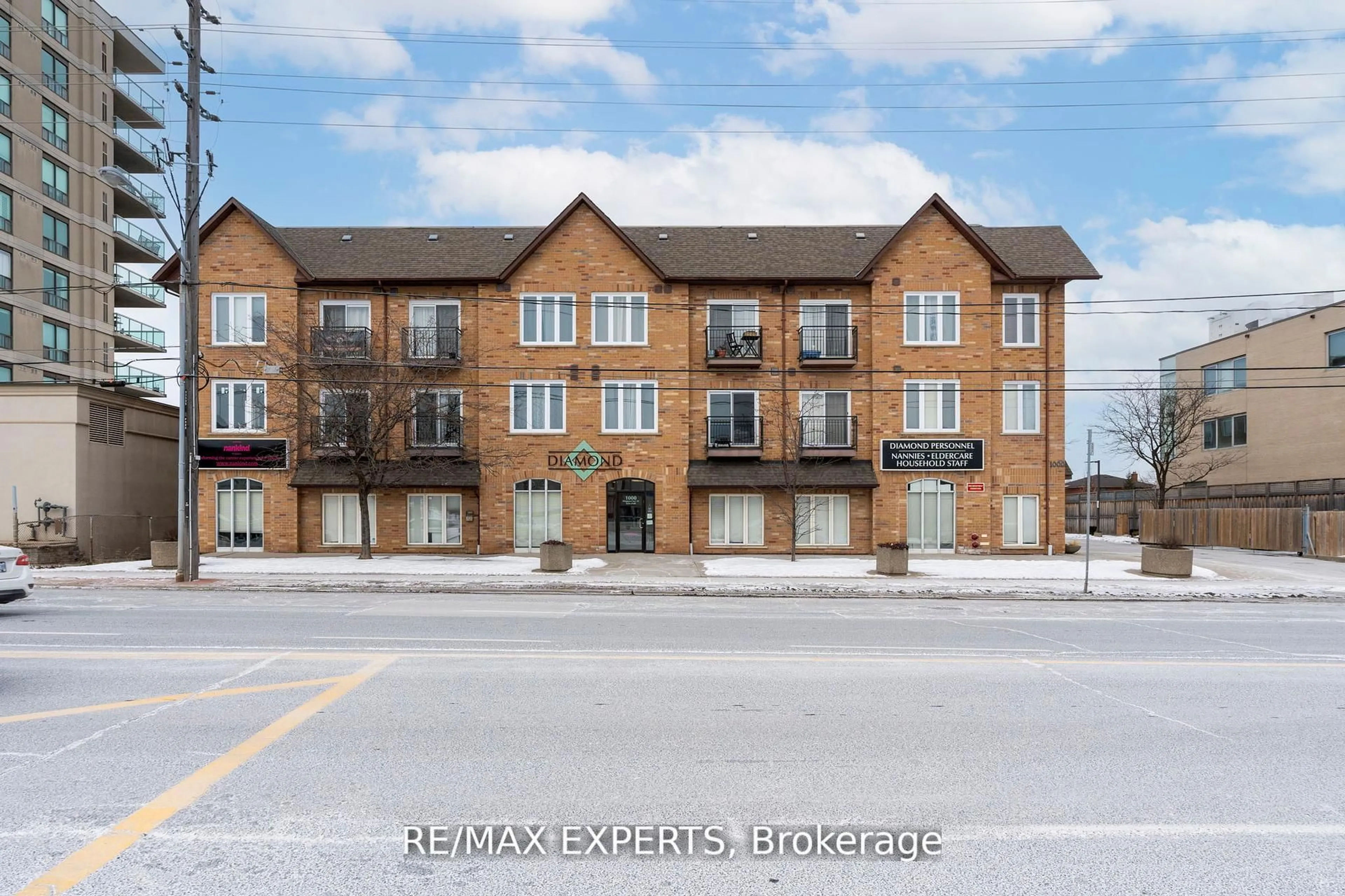 A pic from outside/outdoor area/front of a property/back of a property/a pic from drone, building for 1000 Sheppard Ave #206, Toronto Ontario M3H 2T6