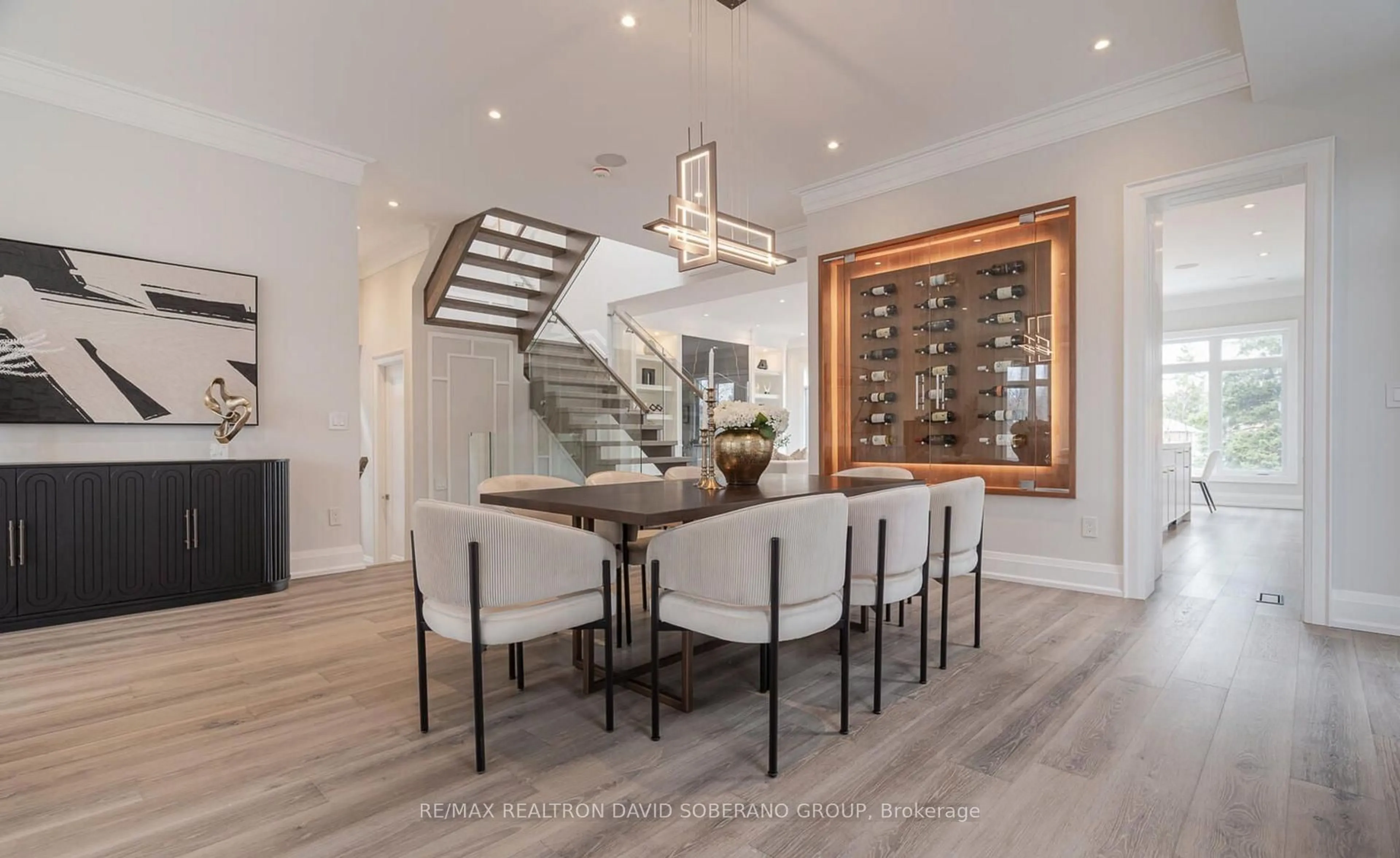 Dining room, wood/laminate floor for 106 Allingham Gdns, Toronto Ontario M3H 1Y2