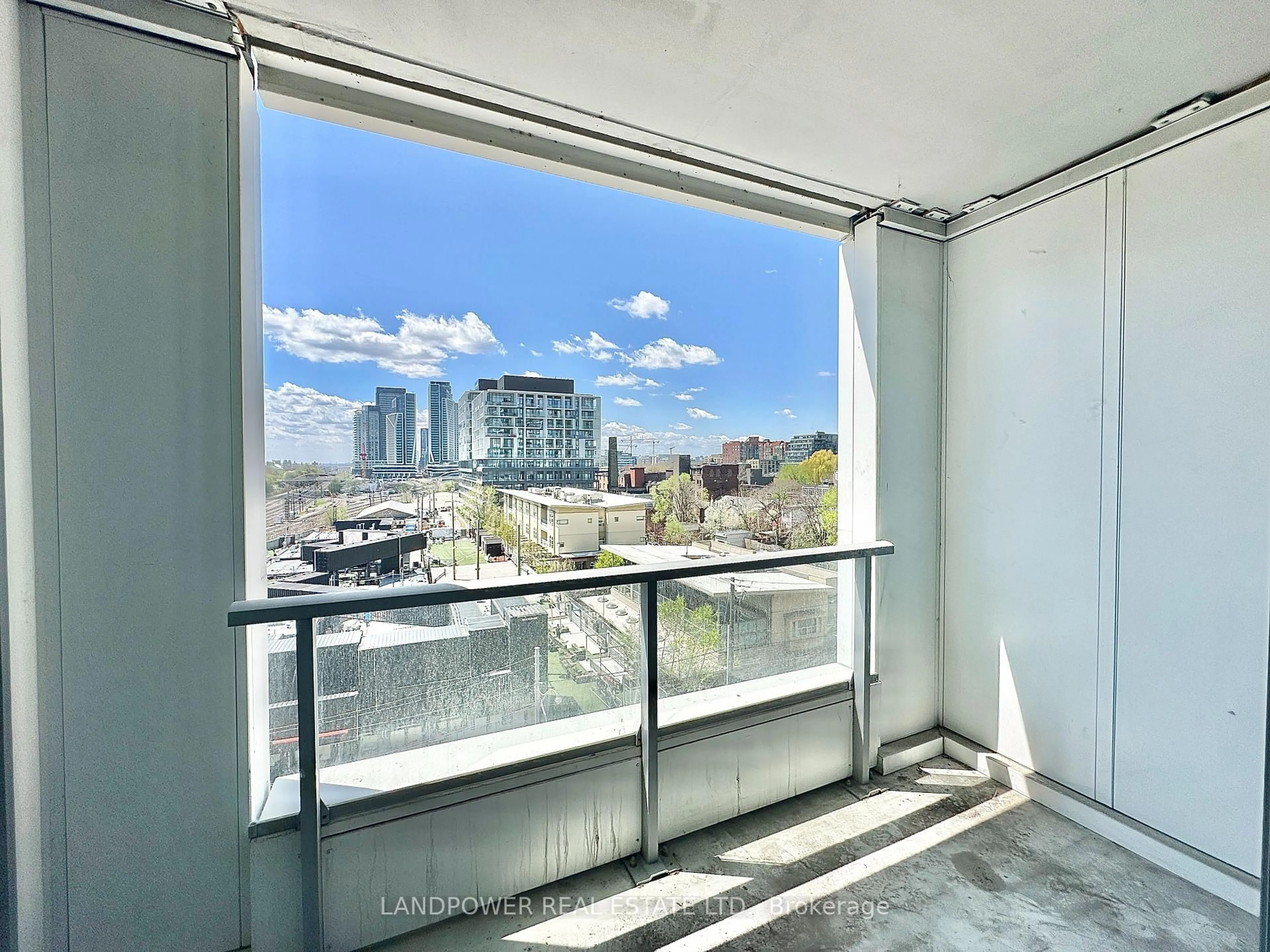 Balcony in the apartment, city buildings view from balcony for 27 Bathurst St #509W, Toronto Ontario M5V 2P1