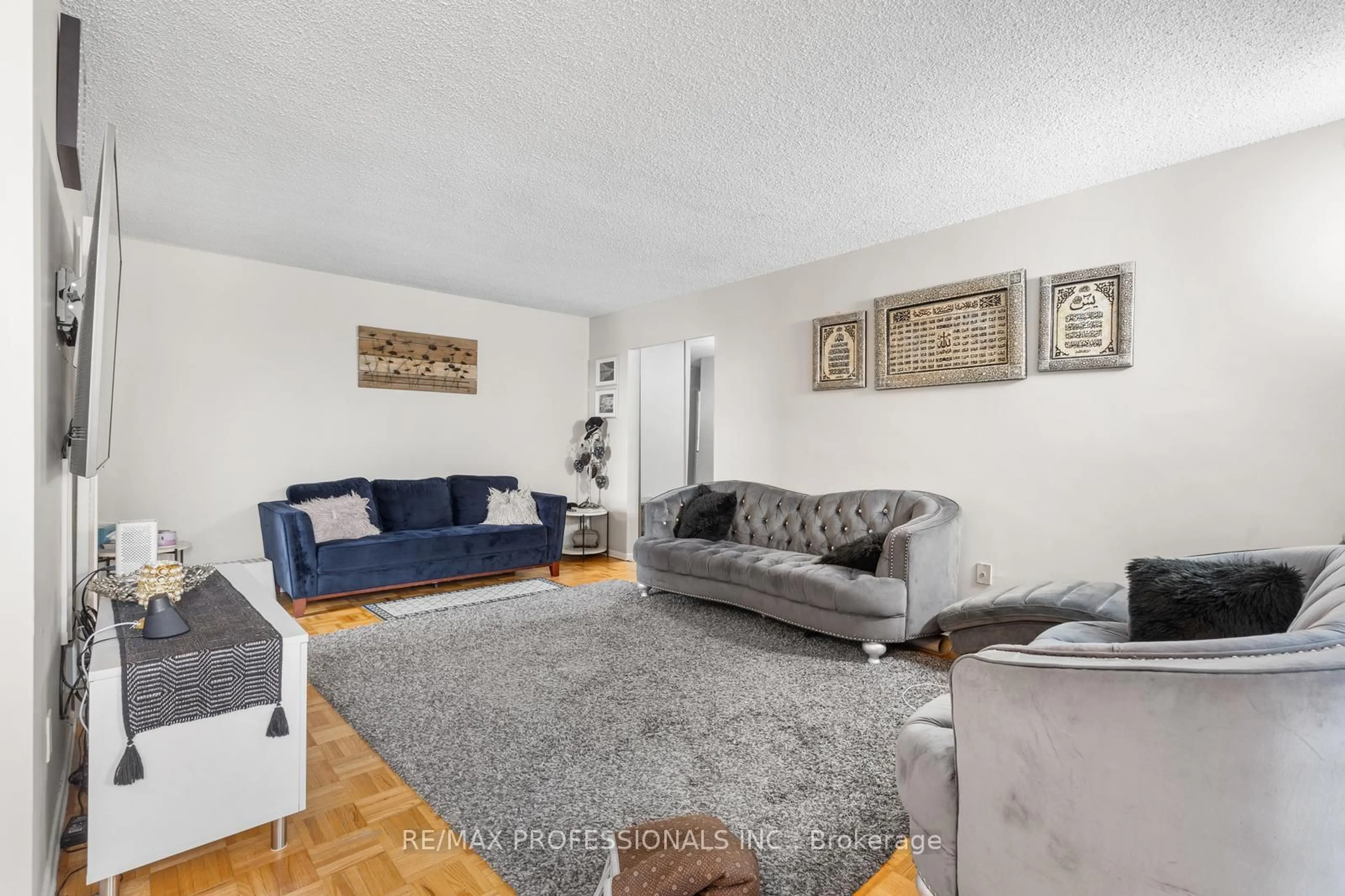 Living room with furniture, unknown for 60 Pavane Linkway #1414, Toronto Ontario M3C 1A2
