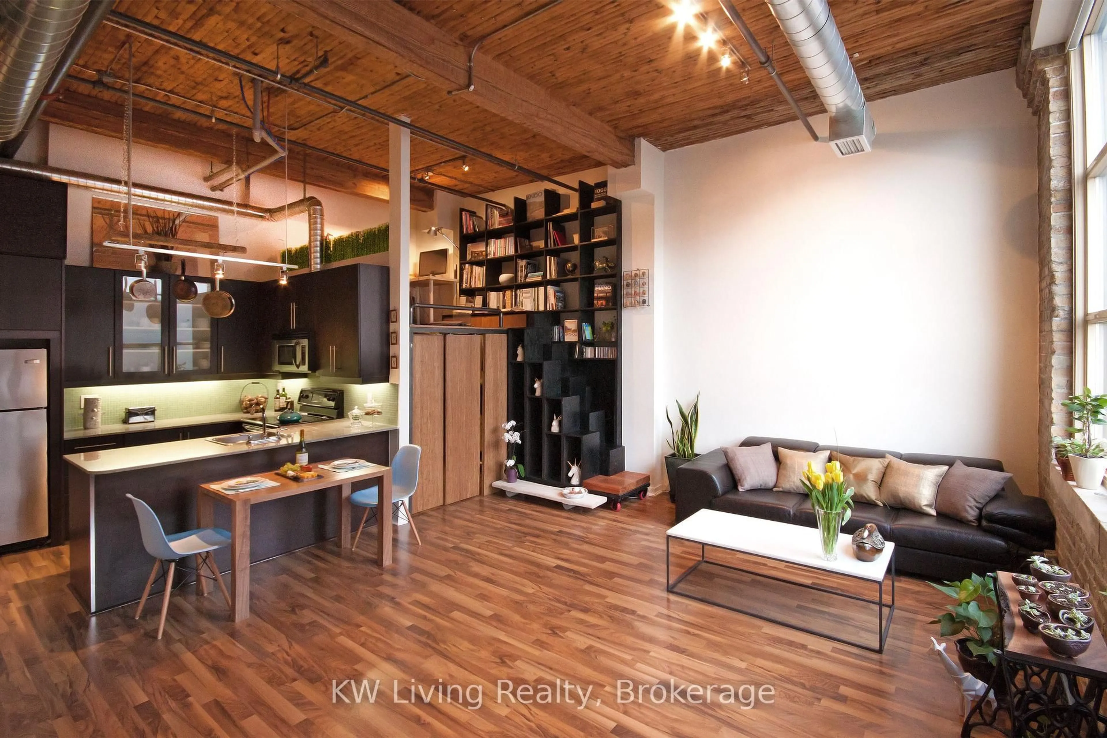Open concept kitchen, wood/laminate floor for 736 Dundas St #402, Toronto Ontario M5A 2C5