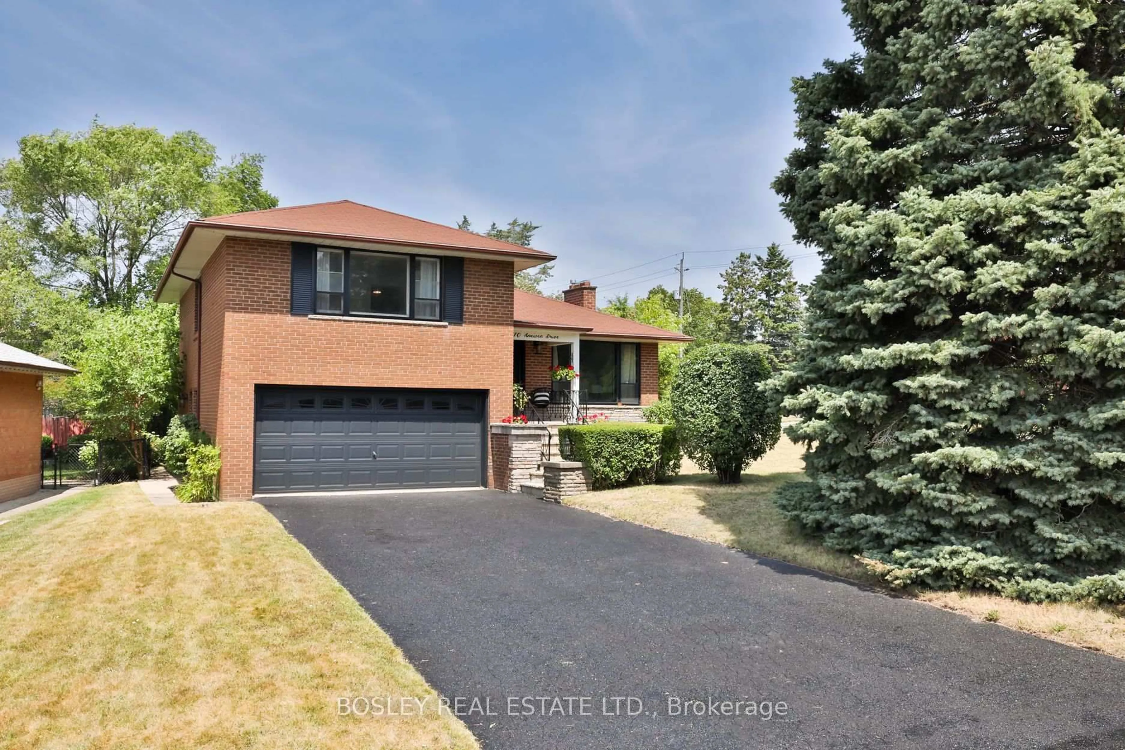 Home with brick exterior material, street for 70 Anewen Dr, Toronto Ontario M4A 1S3