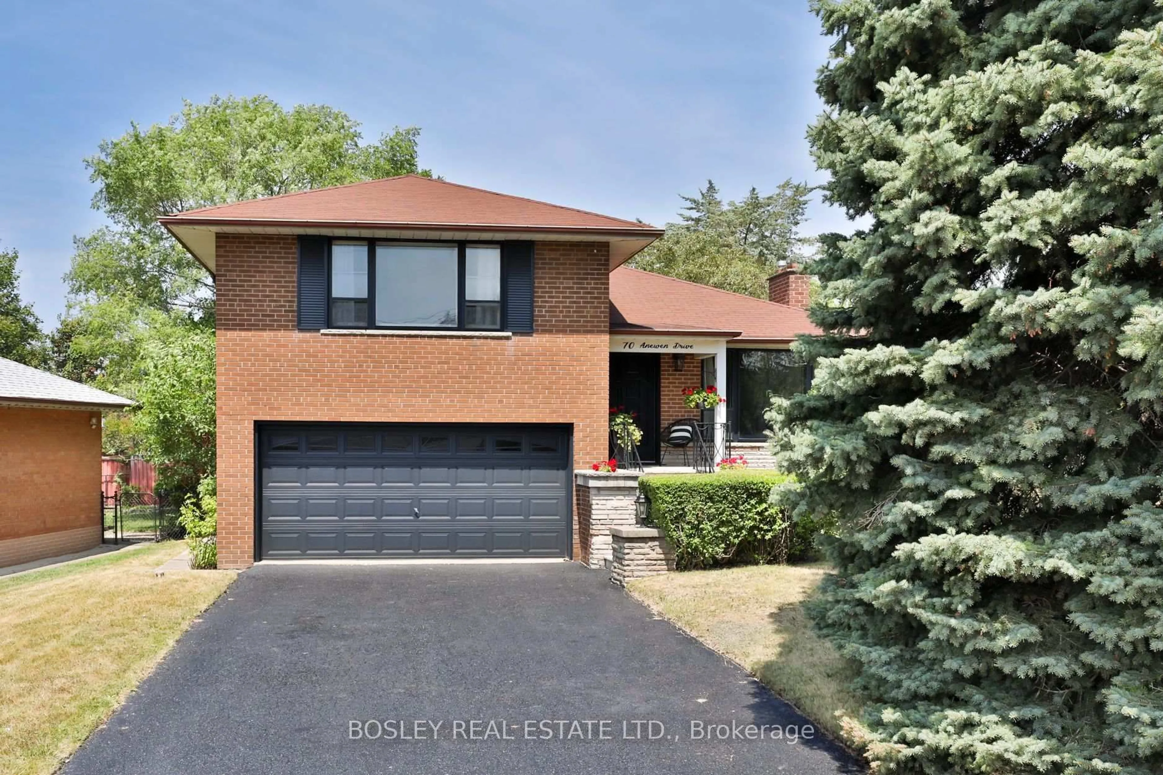 Home with brick exterior material, street for 70 Anewen Dr, Toronto Ontario M4A 1S3