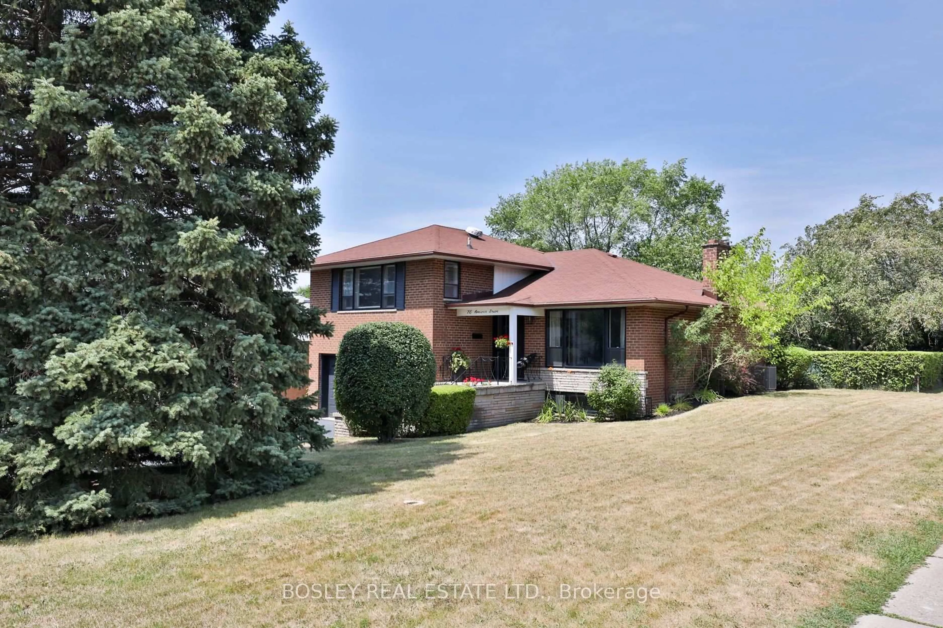Home with brick exterior material, street for 70 Anewen Dr, Toronto Ontario M4A 1S3