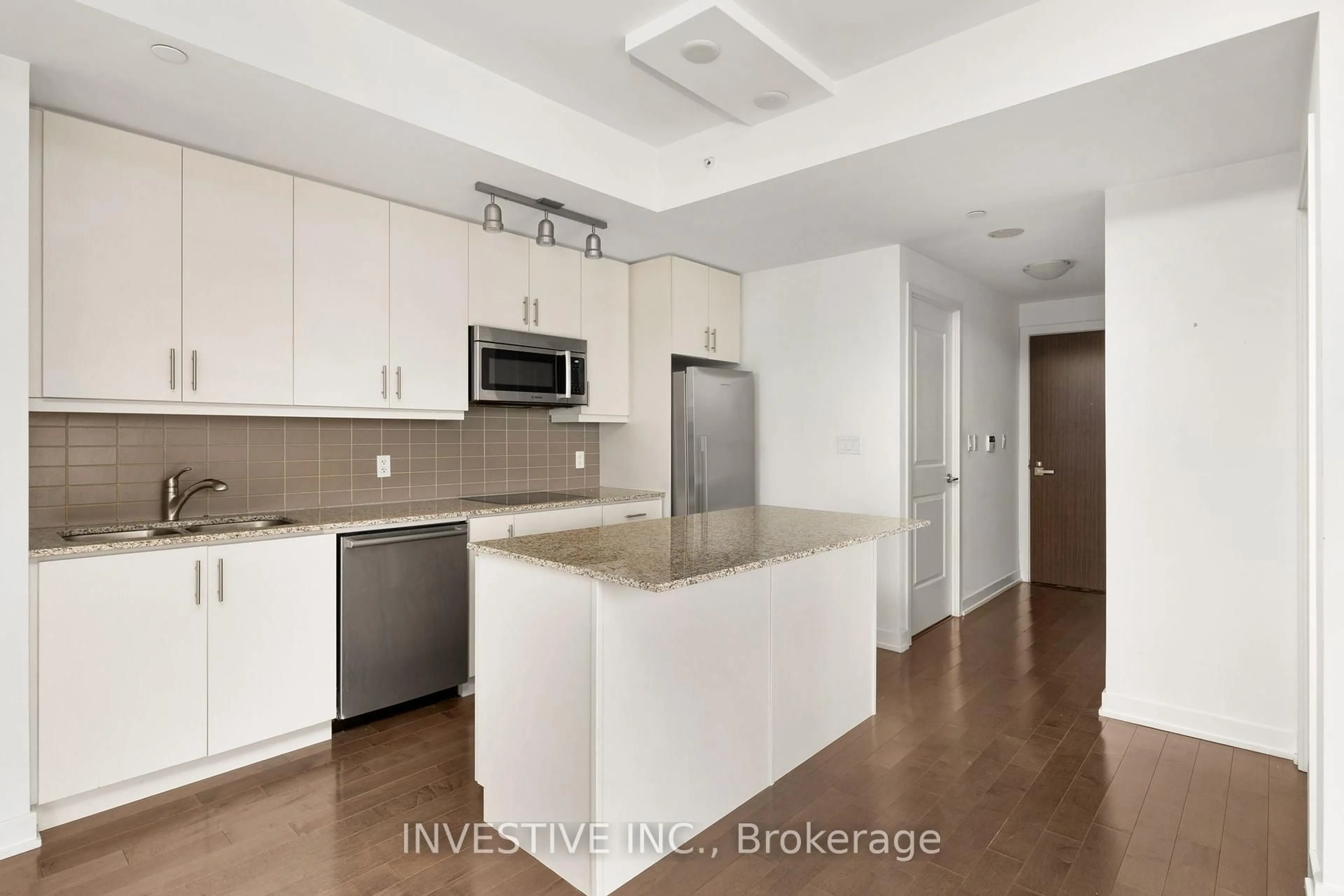 Open concept kitchen, unknown for 1 The Esplanade #2306, Toronto Ontario M5E 0A8