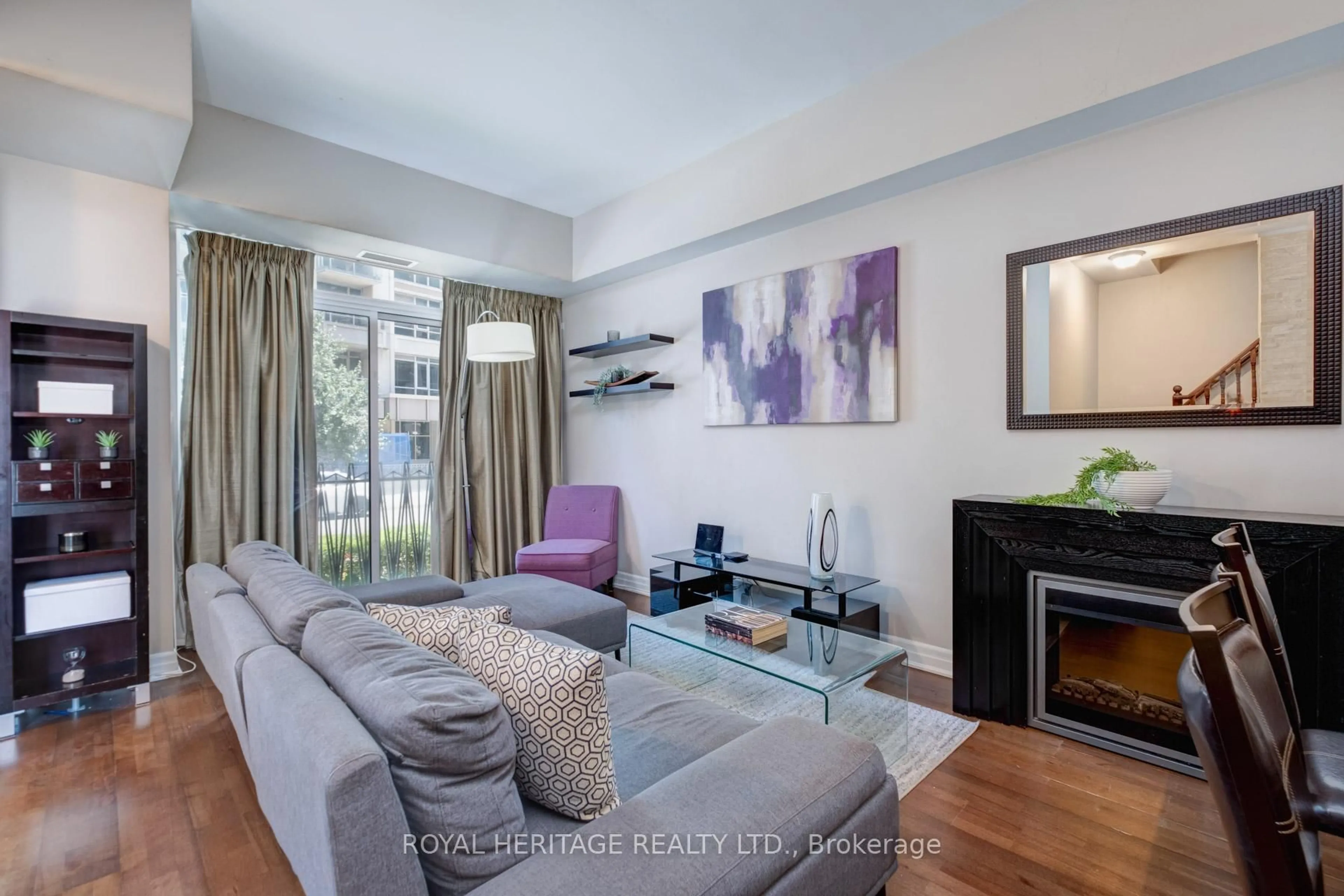 Living room with furniture, wood/laminate floor for 16 Grand Magazine St #9, Toronto Ontario M5V 1B4