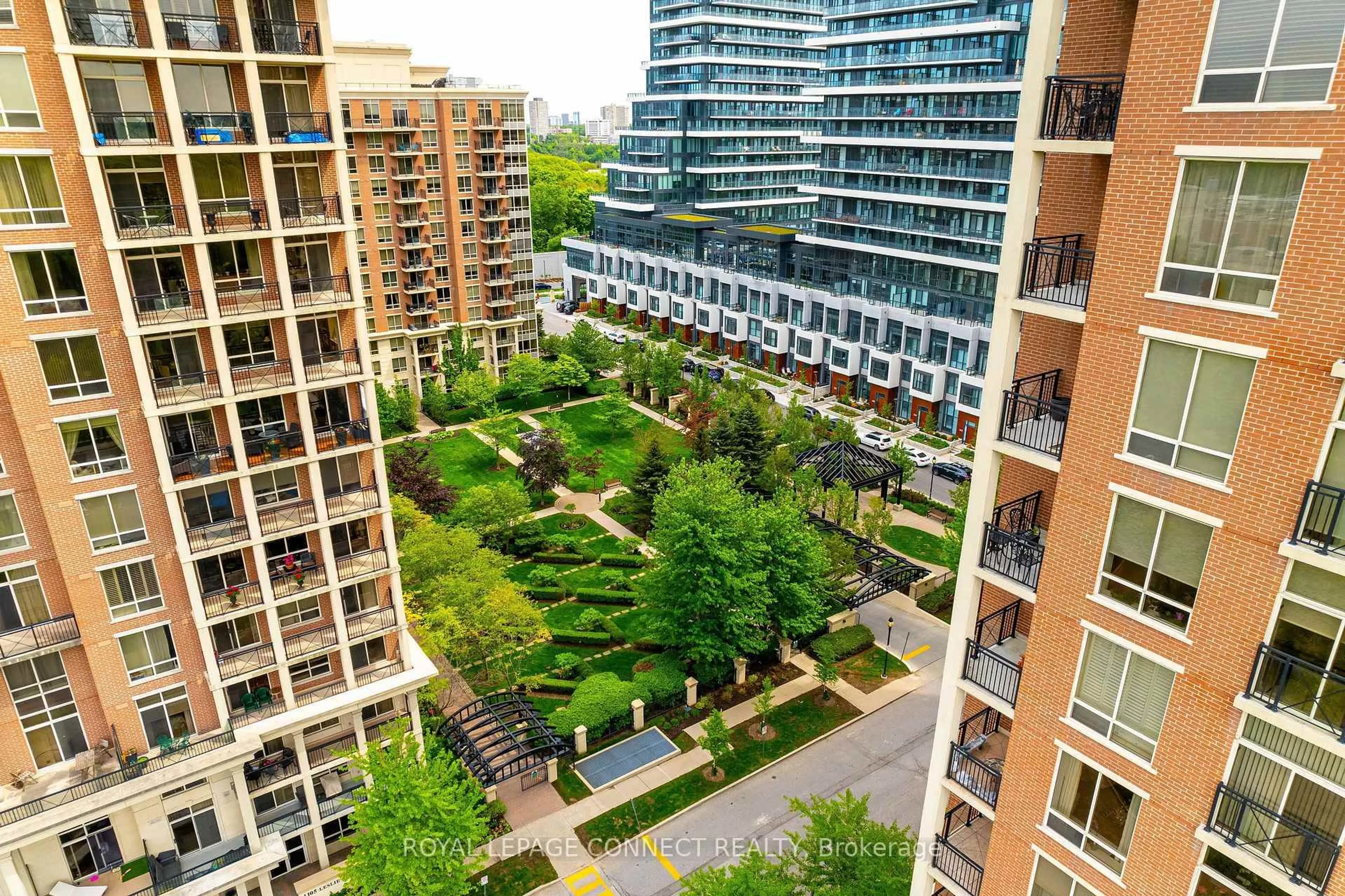 Patio, city buildings view from balcony for 1101 Leslie St #403, Toronto Ontario M3C 4G3