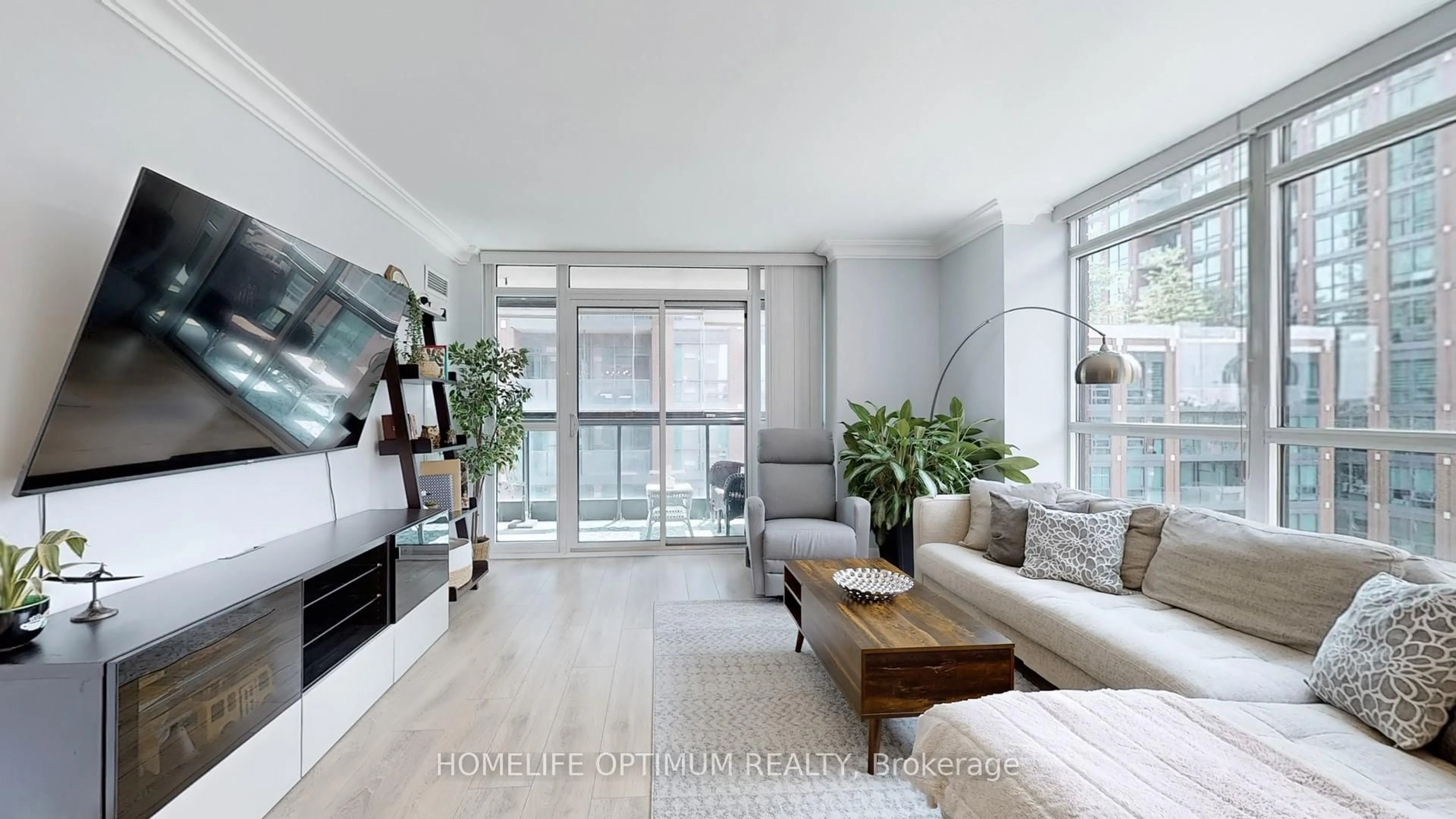 Living room with furniture, wood/laminate floor for 525 Wilson Ave #602, Toronto Ontario M3H 0A7