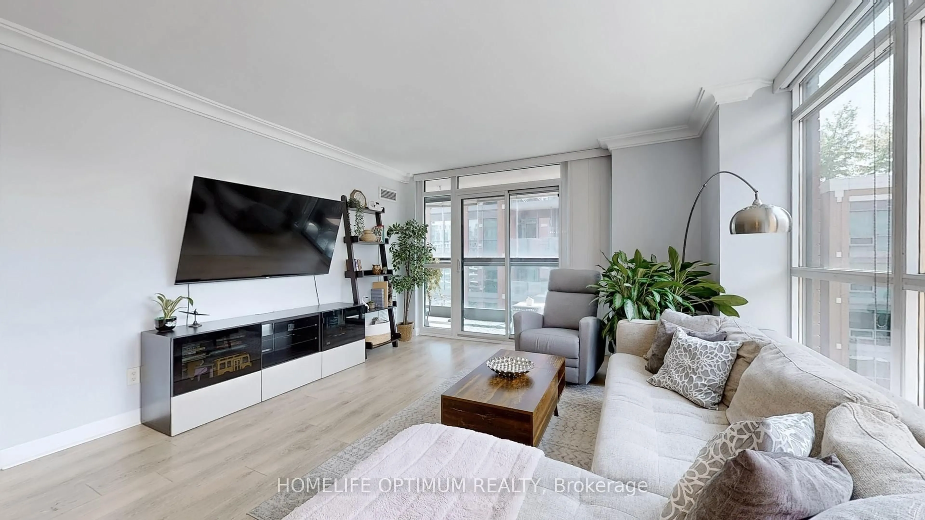 Living room with furniture, wood/laminate floor for 525 Wilson Ave #602, Toronto Ontario M3H 0A7