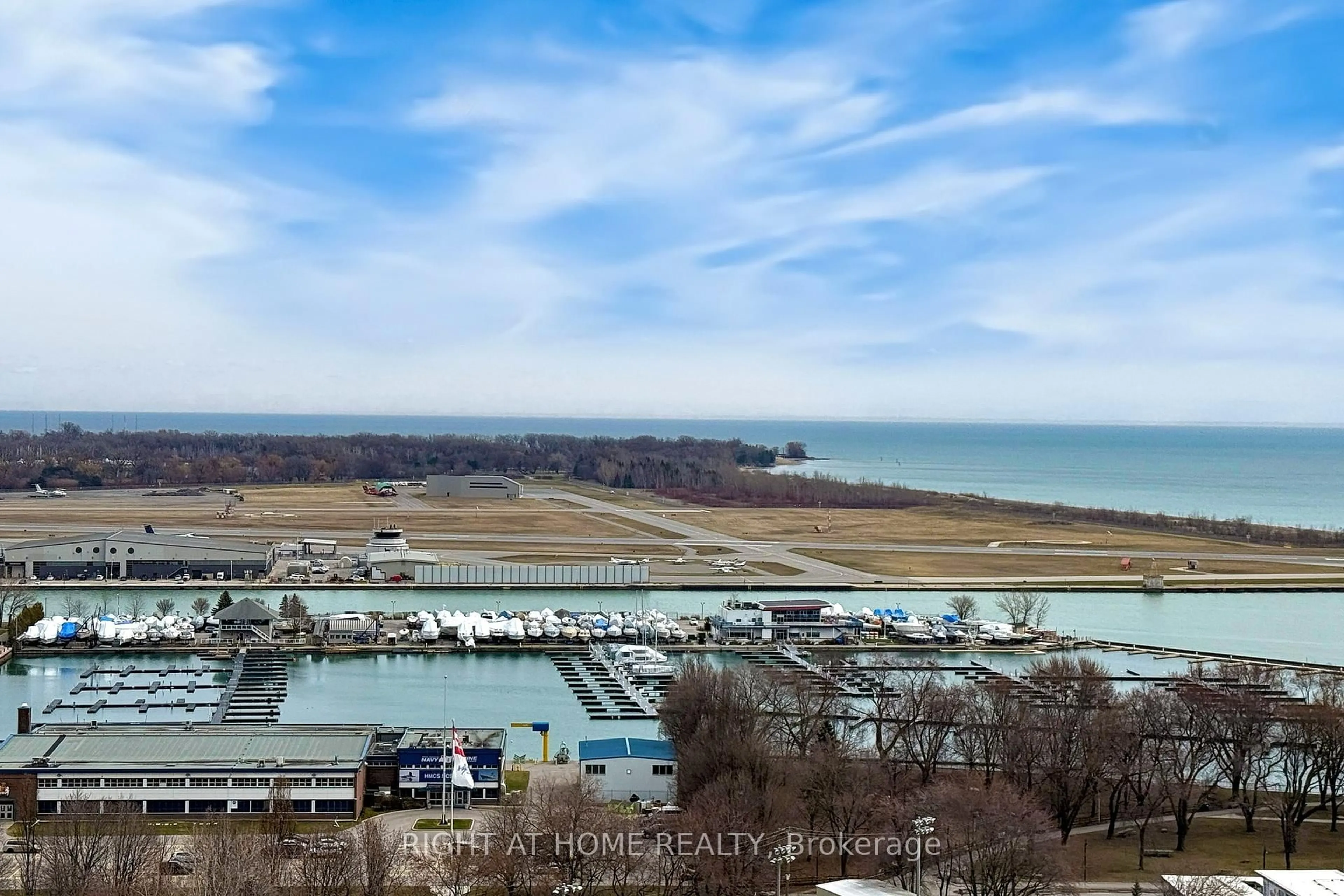 A pic from outside/outdoor area/front of a property/back of a property/a pic from drone, water/lake/river/ocean view for 219 Fort York Blvd #2205, Toronto Ontario M5V 1B1