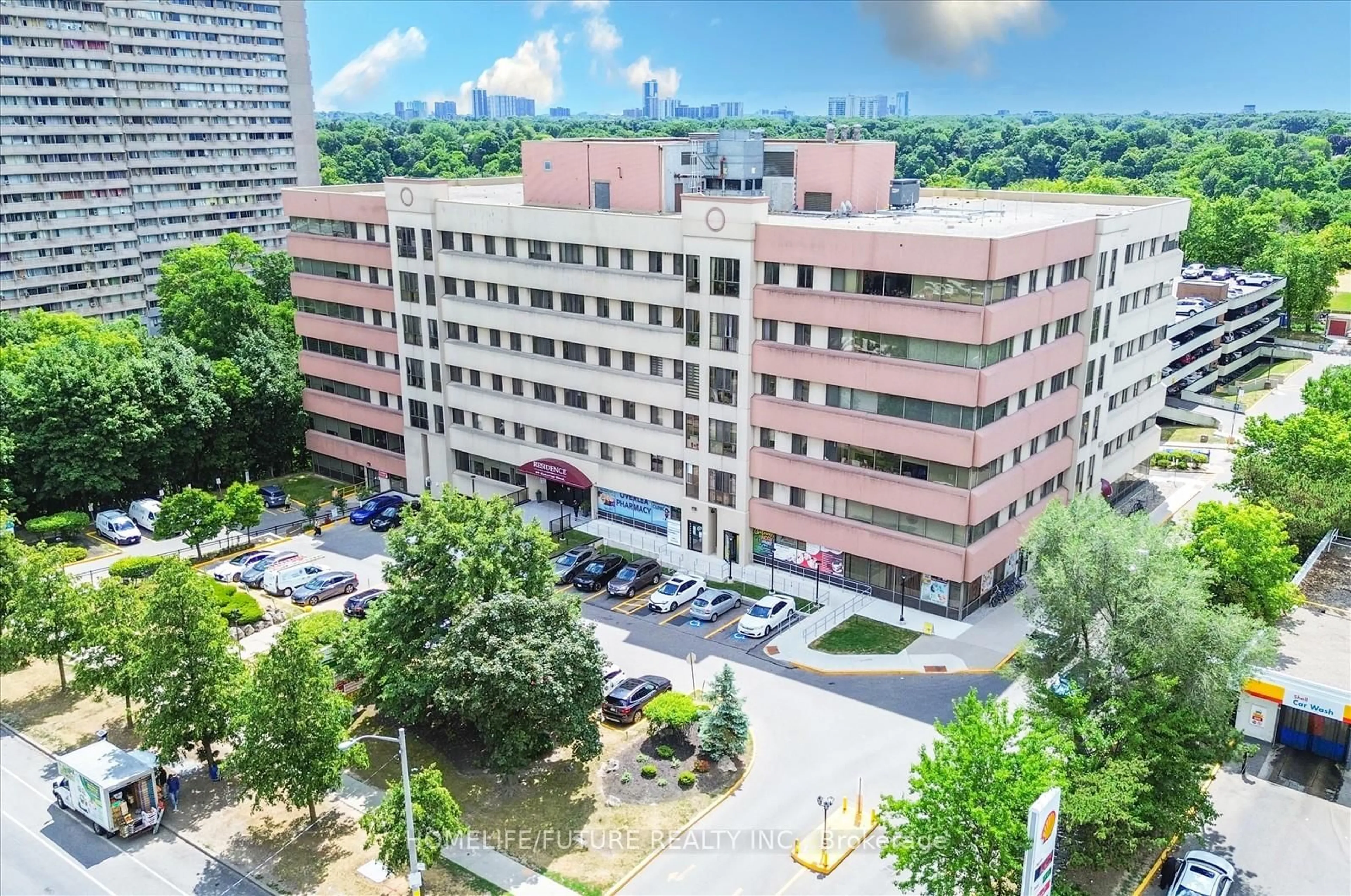 A pic from outside/outdoor area/front of a property/back of a property/a pic from drone, city buildings view from balcony for 10 Gateway Blvd #506, Toronto Ontario M3C 3A1