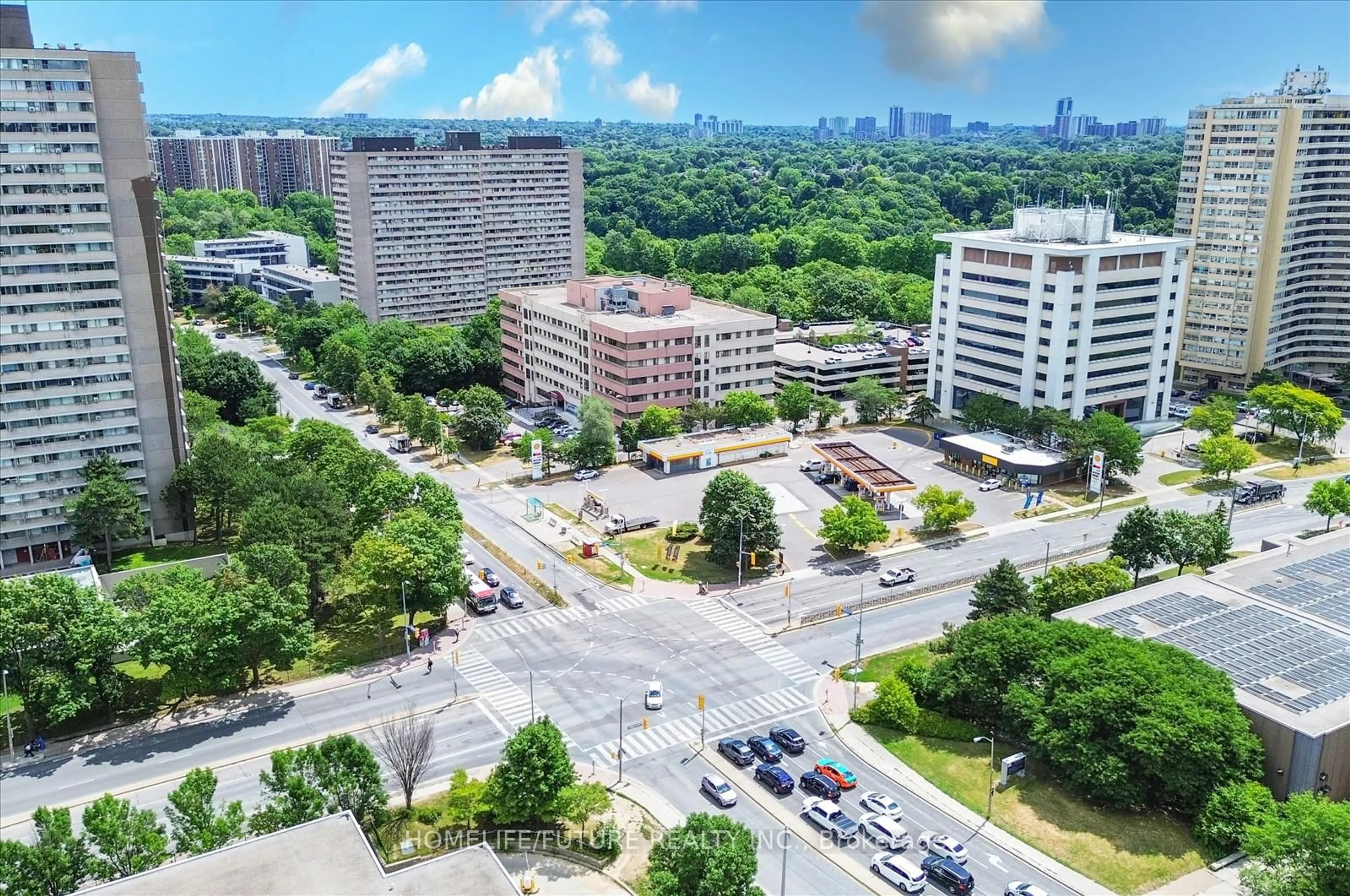 A pic from outside/outdoor area/front of a property/back of a property/a pic from drone, city buildings view from balcony for 10 Gateway Blvd #506, Toronto Ontario M3C 3A1