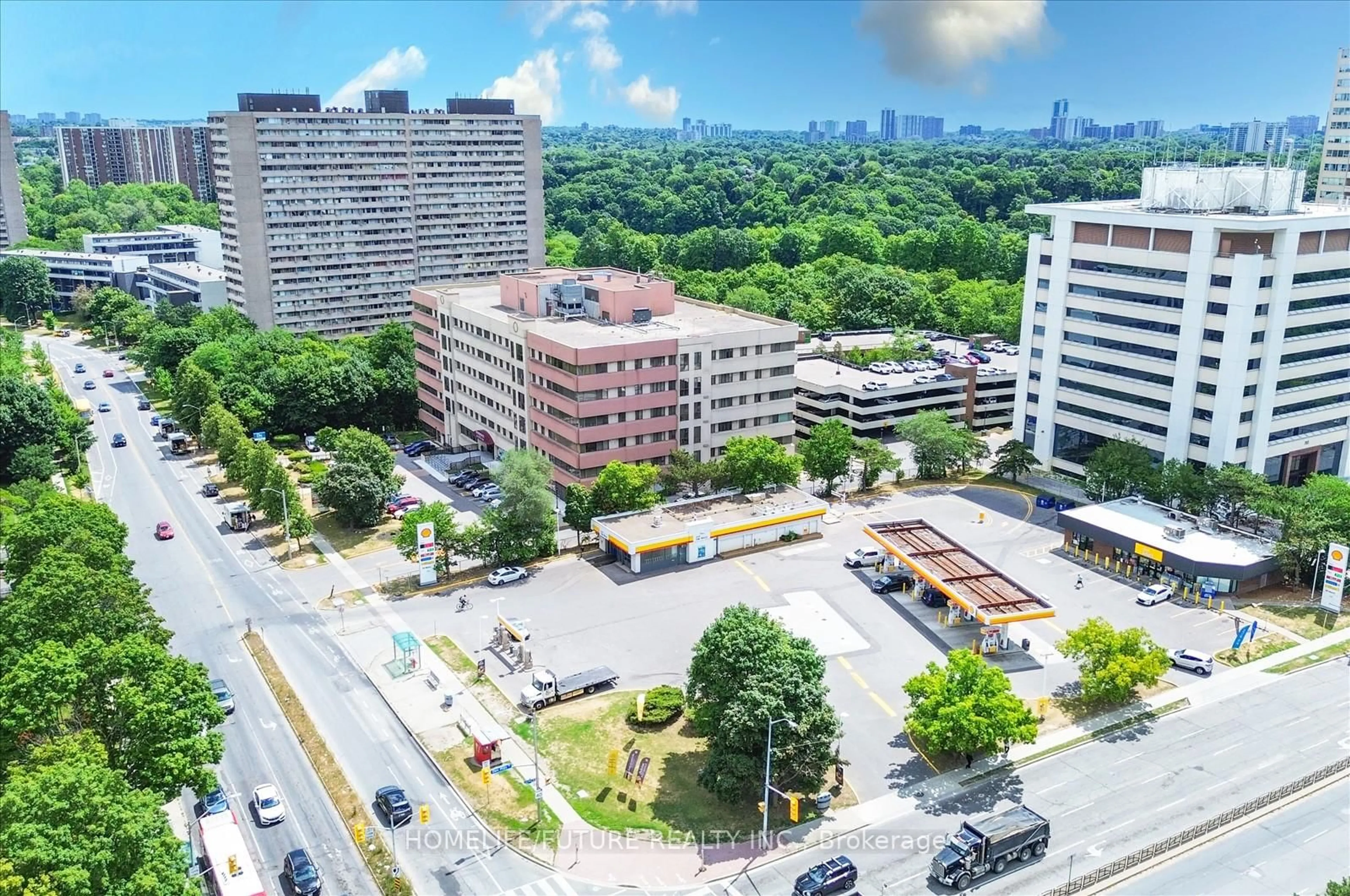 A pic from outside/outdoor area/front of a property/back of a property/a pic from drone, city buildings view from balcony for 10 Gateway Blvd #506, Toronto Ontario M3C 3A1