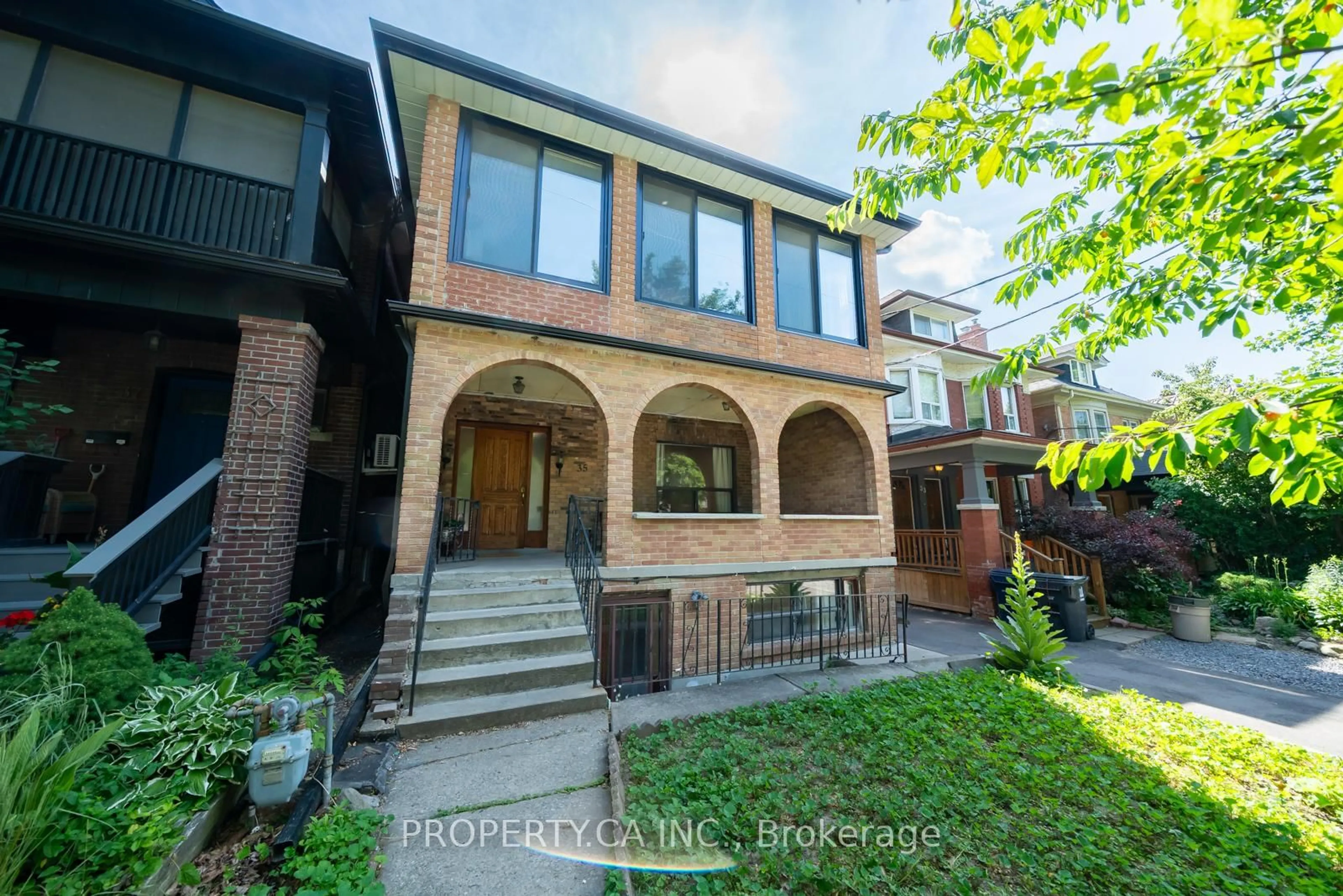 Home with brick exterior material, street for 35 Pinewood Ave, Toronto Ontario M6C 2V2