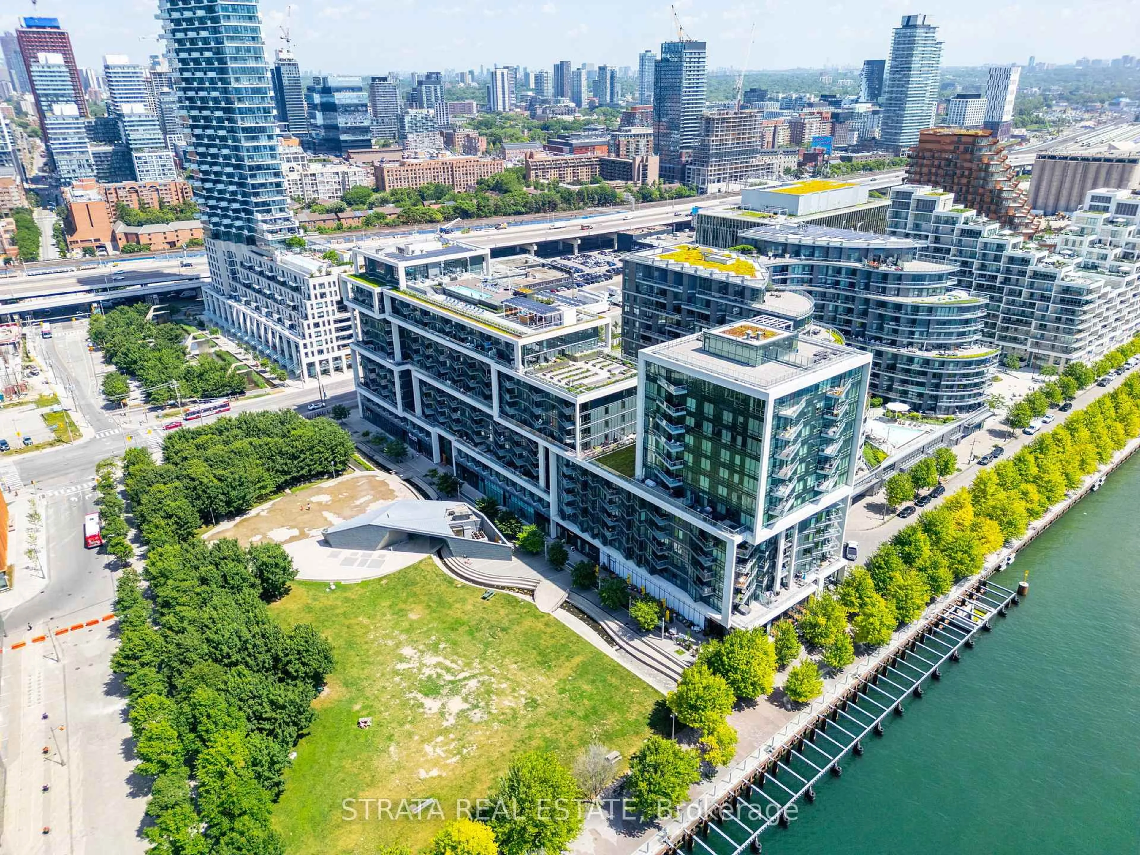 A pic from outside/outdoor area/front of a property/back of a property/a pic from drone, city buildings view from balcony for 55 Merchants' Wharf #415, Toronto Ontario M5A 0P2