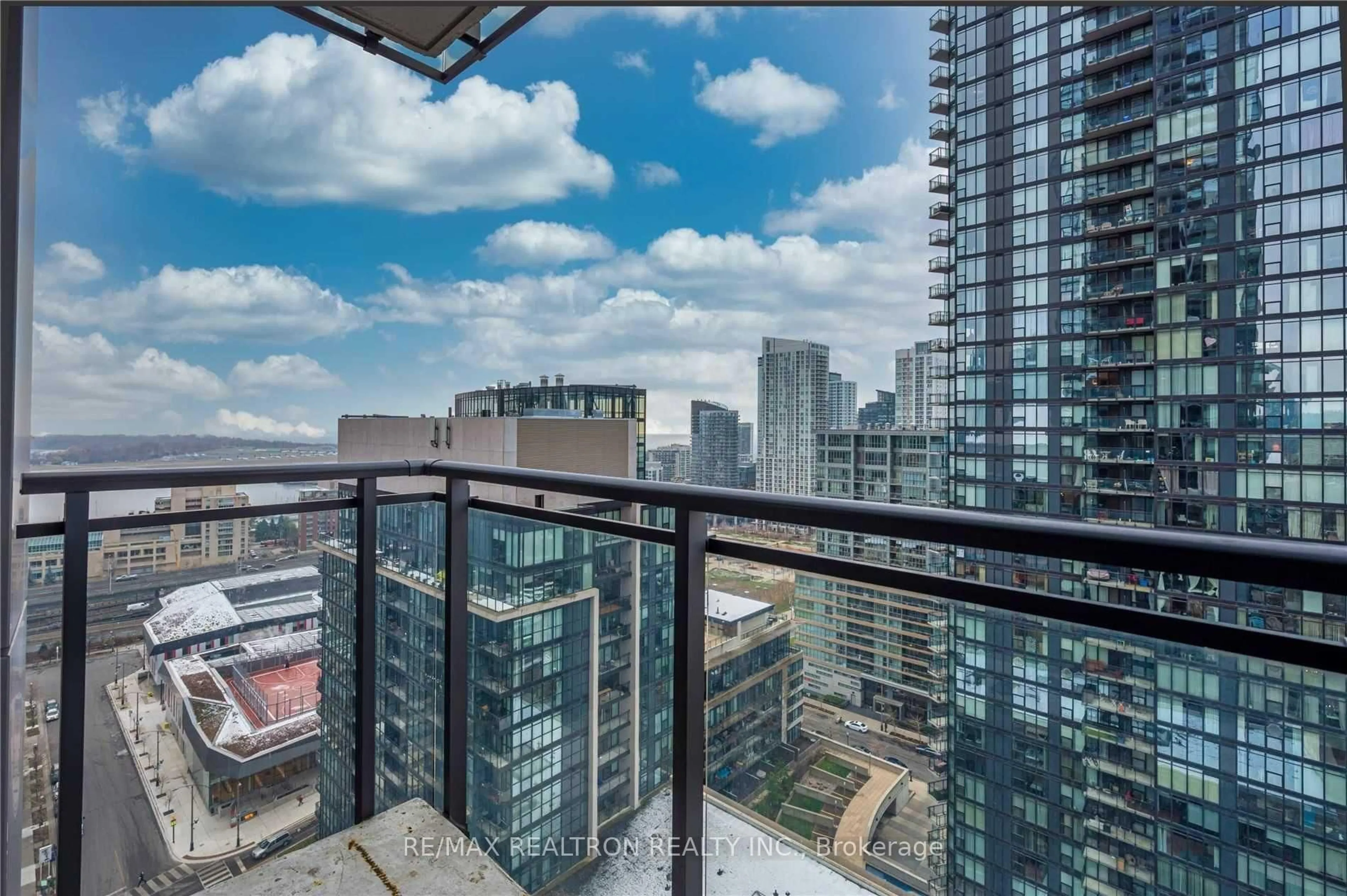 Balcony in the apartment, city buildings view from balcony for 25 Telegram Mews #2112, Toronto Ontario M5V 3Z1