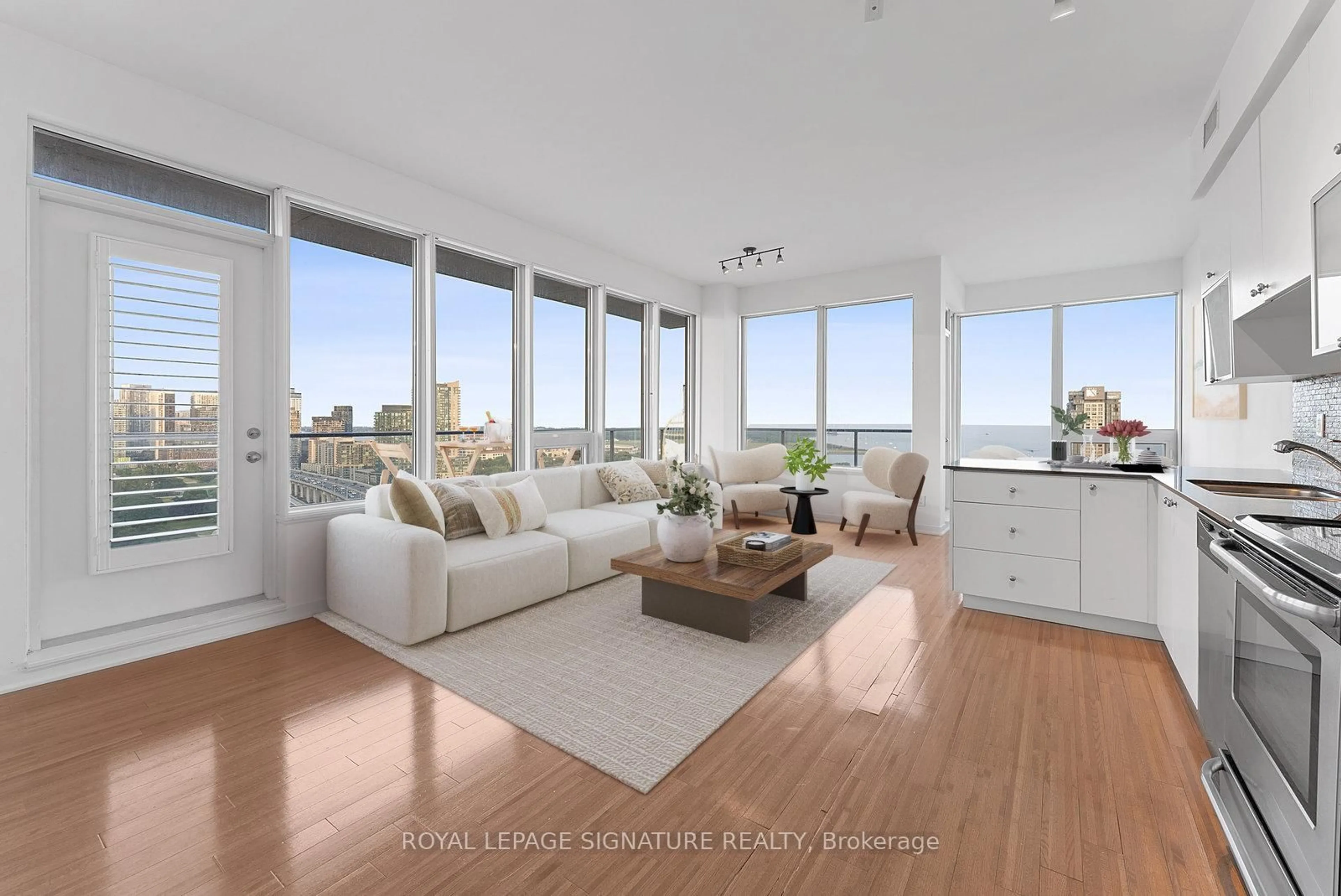 Living room with furniture, wood/laminate floor for 59 East Liberty St #2302, Toronto Ontario M6K 3R1