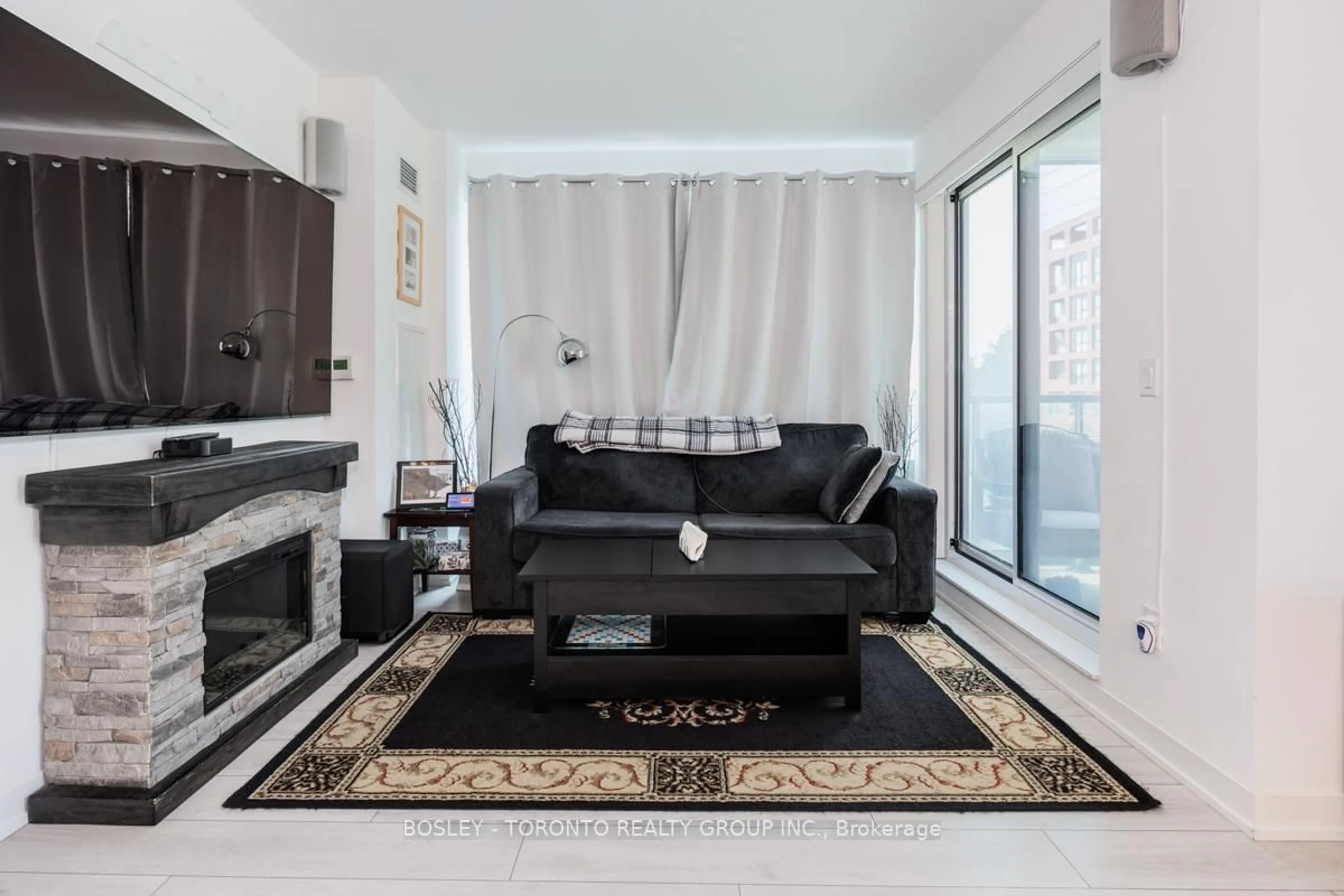 Living room with furniture, unknown for 31 Tippett Rd #363, Toronto Ontario M3H 0C8