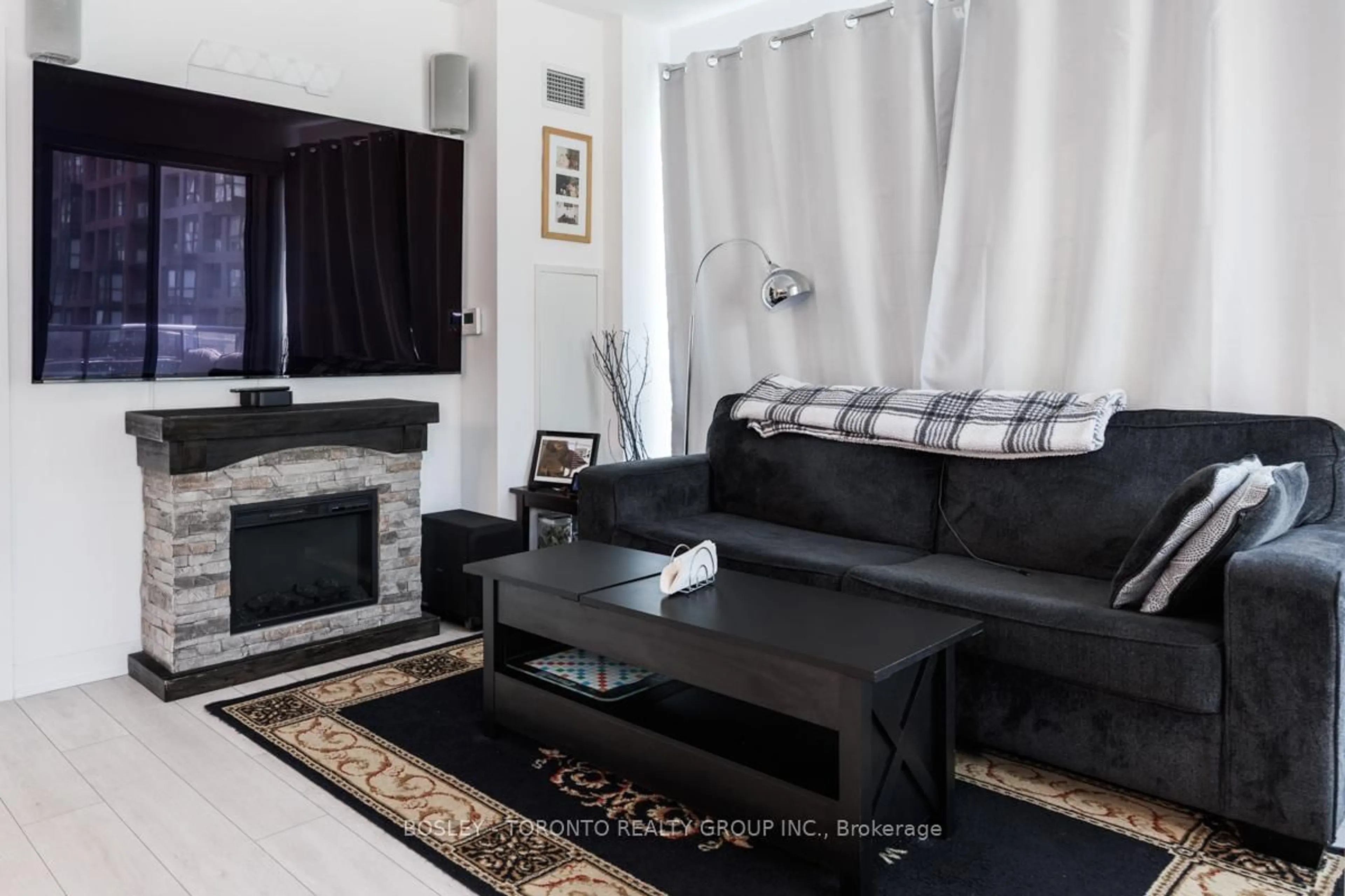 Living room with furniture, unknown for 31 Tippett Rd #363, Toronto Ontario M3H 0C8