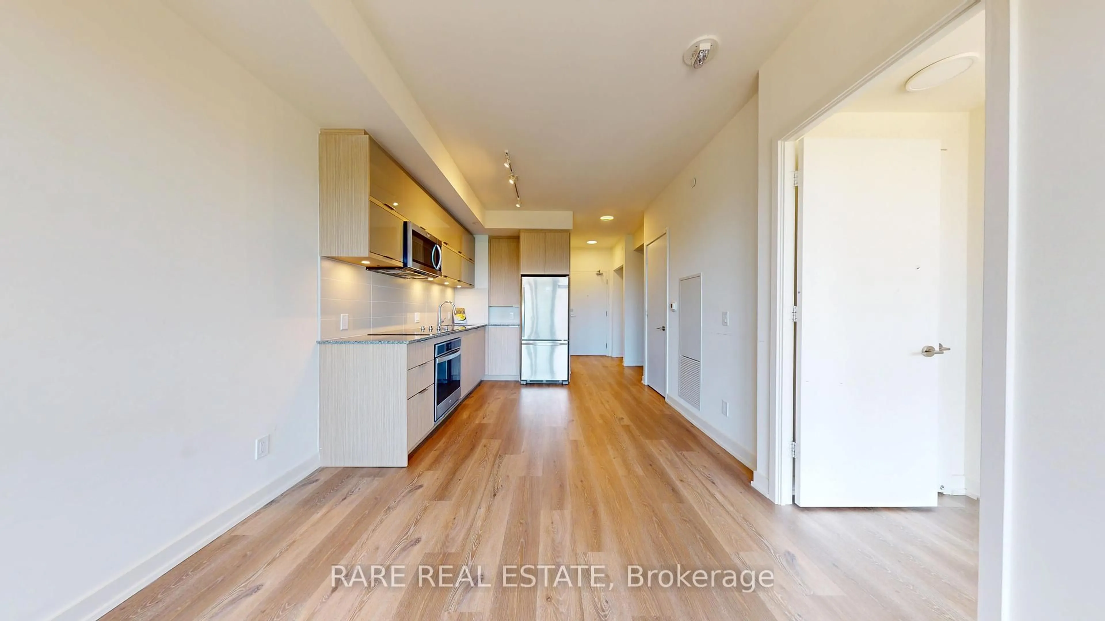 Open concept kitchen, wood/laminate floor for 10 Deerlick Crt #612, Toronto Ontario M3A 0A7