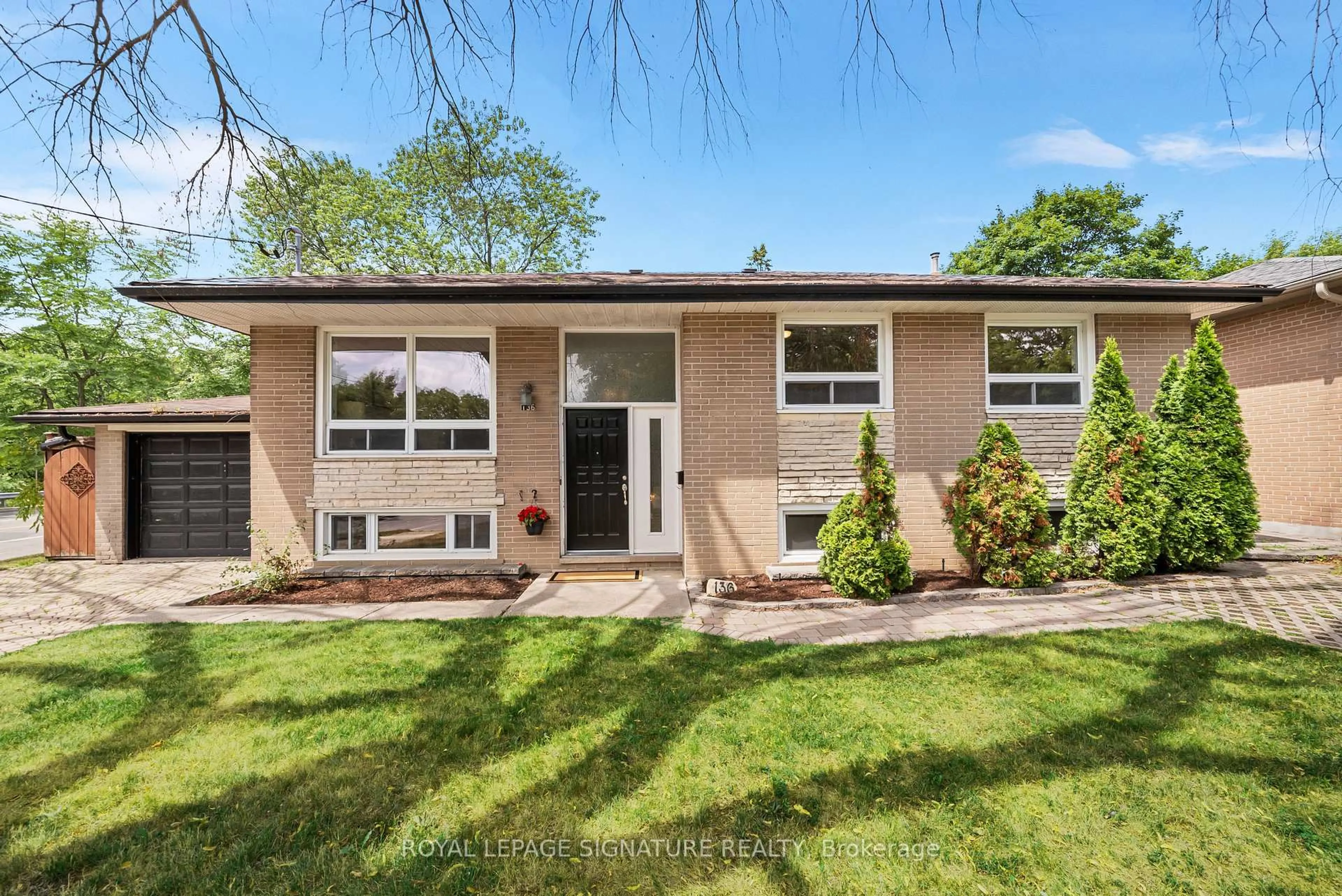 Home with vinyl exterior material, street for 136 Overland Dr, Toronto Ontario M3C 2C8