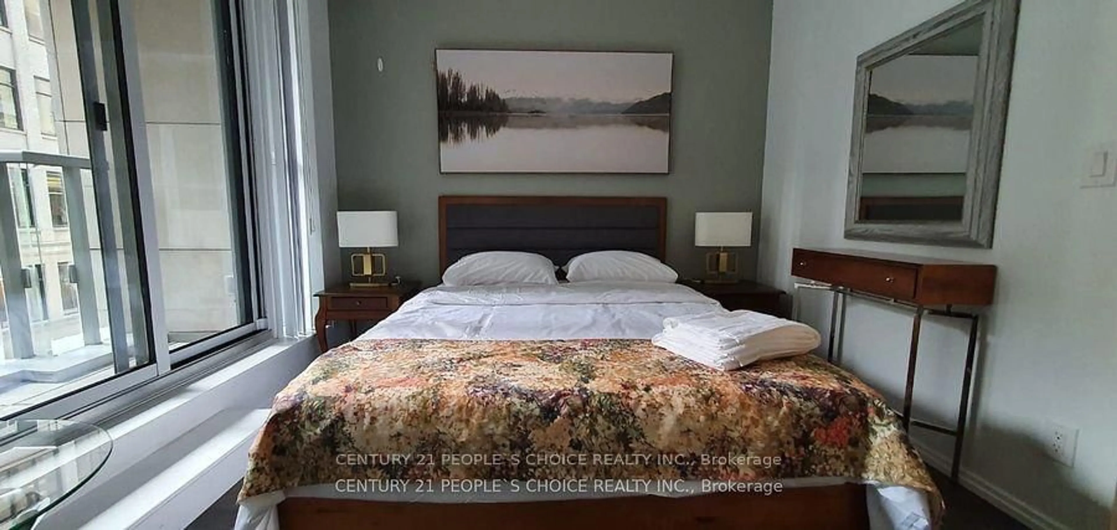 Bedroom with bed, wood/laminate floor for 70 Temperance St #411, Toronto Ontario M5H 4E8