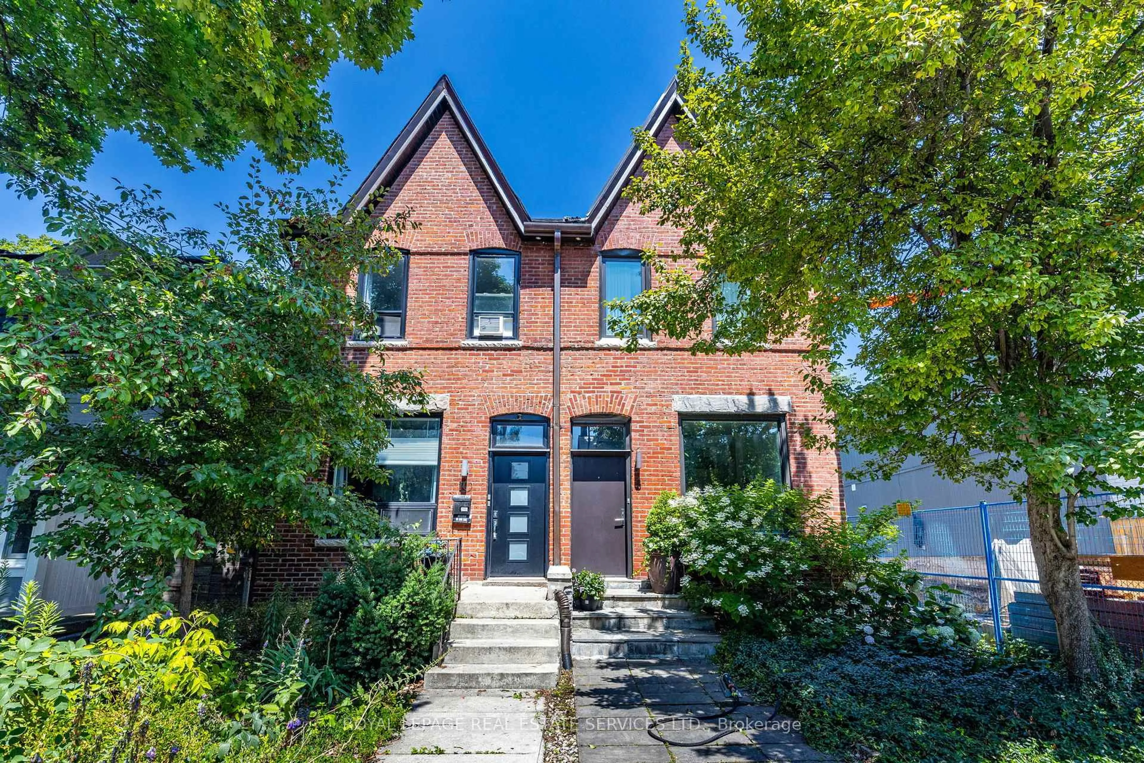 Home with brick exterior material, street for 10 Follis Ave, Toronto Ontario M6G 1S3