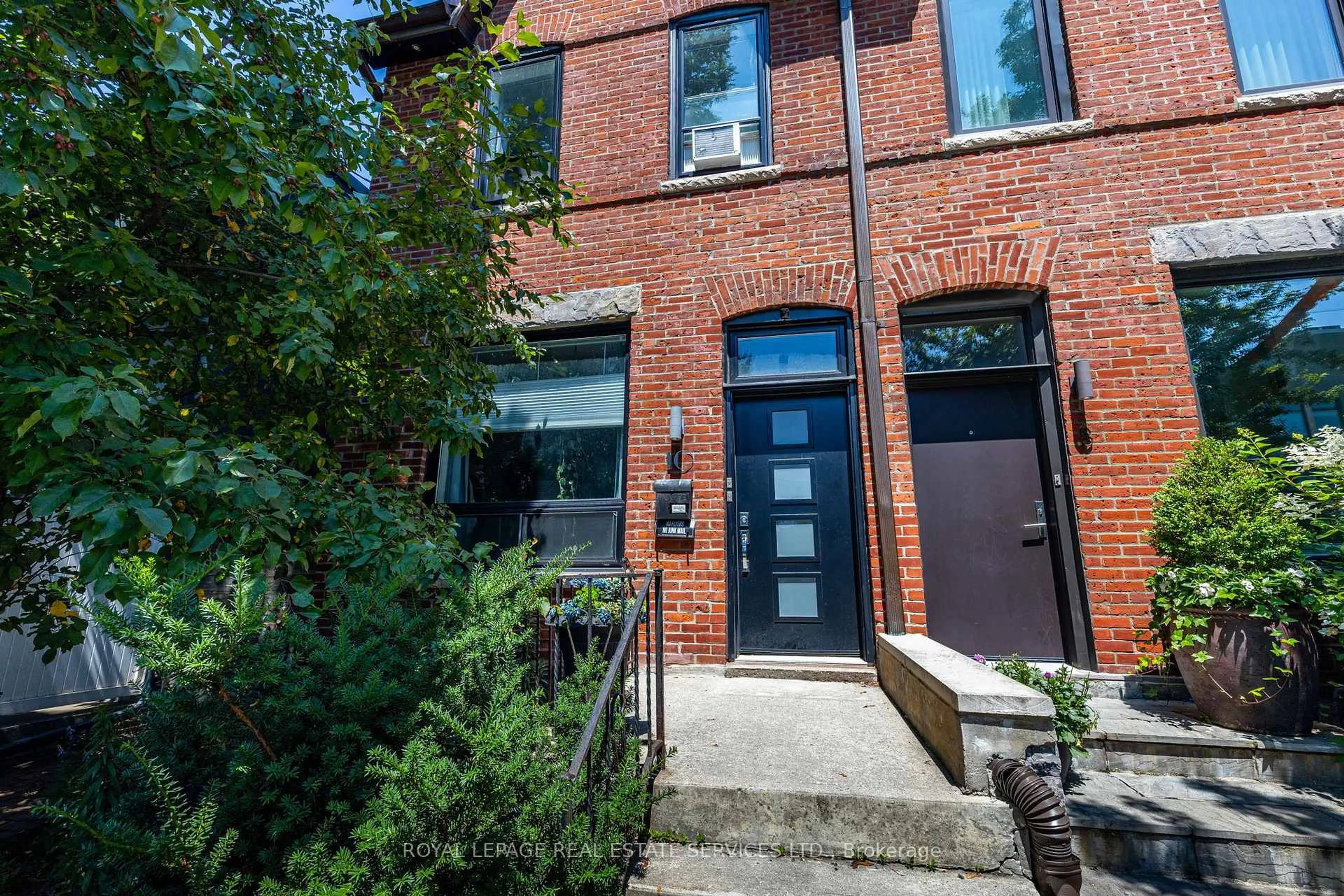 Home with brick exterior material, street for 10 Follis Ave, Toronto Ontario M6G 1S3