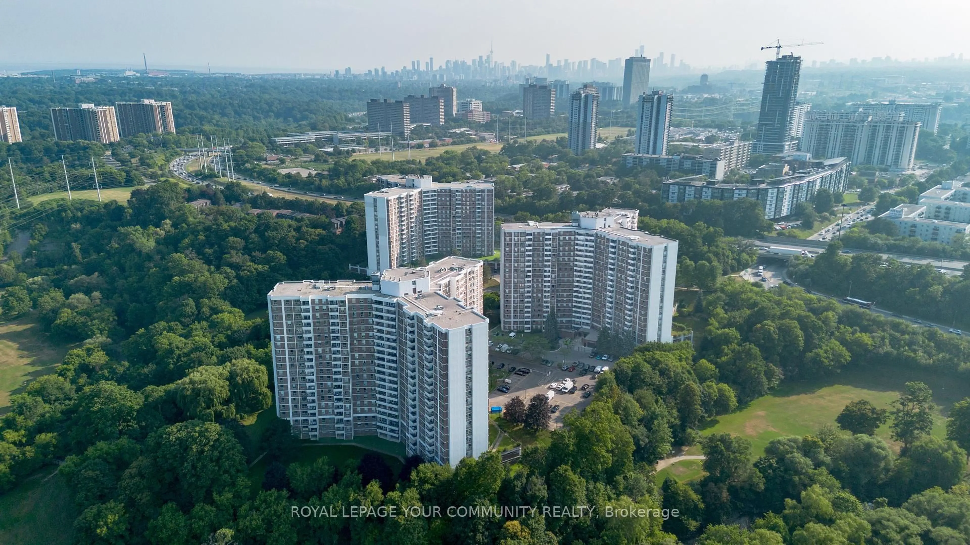 A pic from outside/outdoor area/front of a property/back of a property/a pic from drone, city buildings view from balcony for 20 Edgecliff Gfwy #1218, Toronto Ontario M3C 3A4