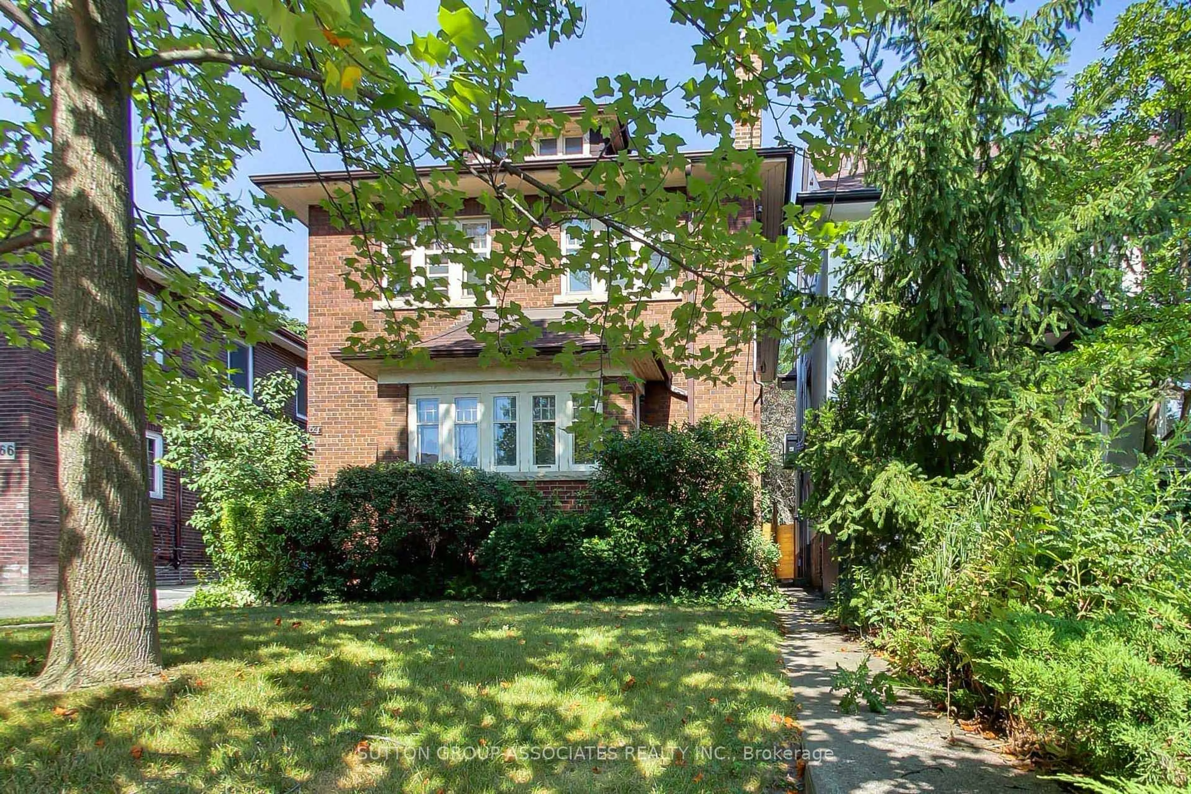 Home with brick exterior material, street for 64 Burnside Dr, Toronto Ontario M6G 2M8