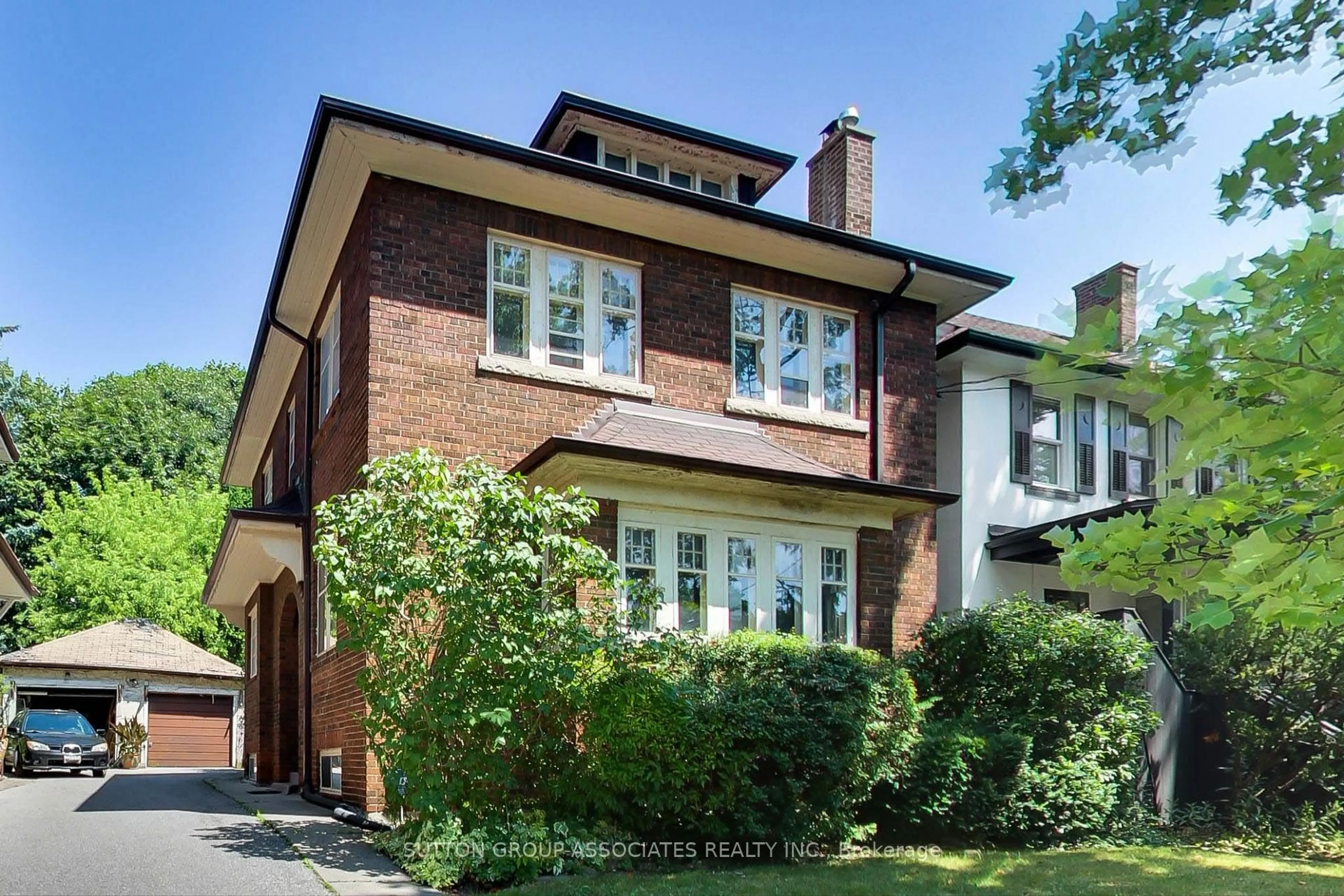 Home with brick exterior material, street for 64 Burnside Dr, Toronto Ontario M6G 2M8