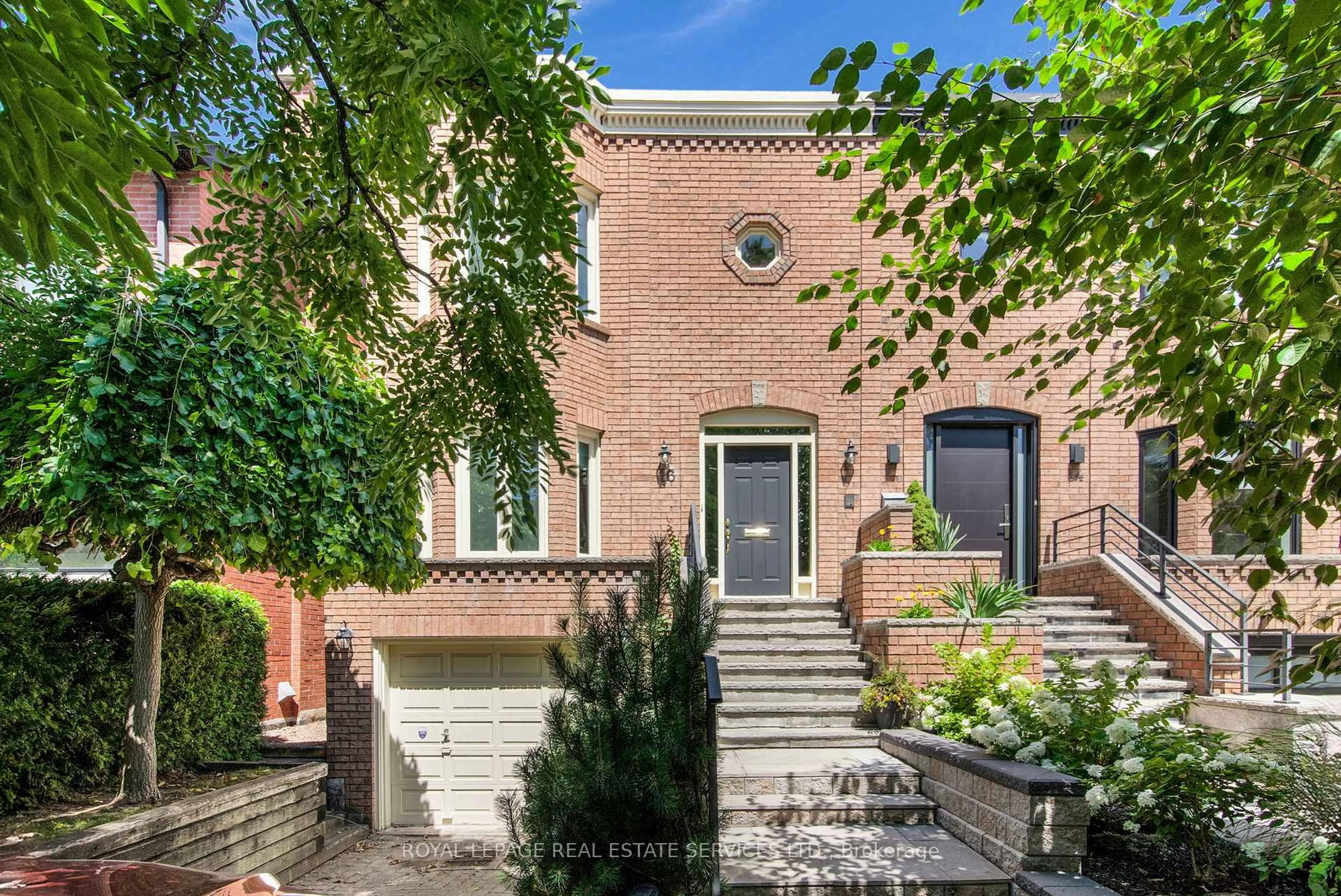 Home with brick exterior material, street for 16 Duggan Ave, Toronto Ontario M4V 1Y2
