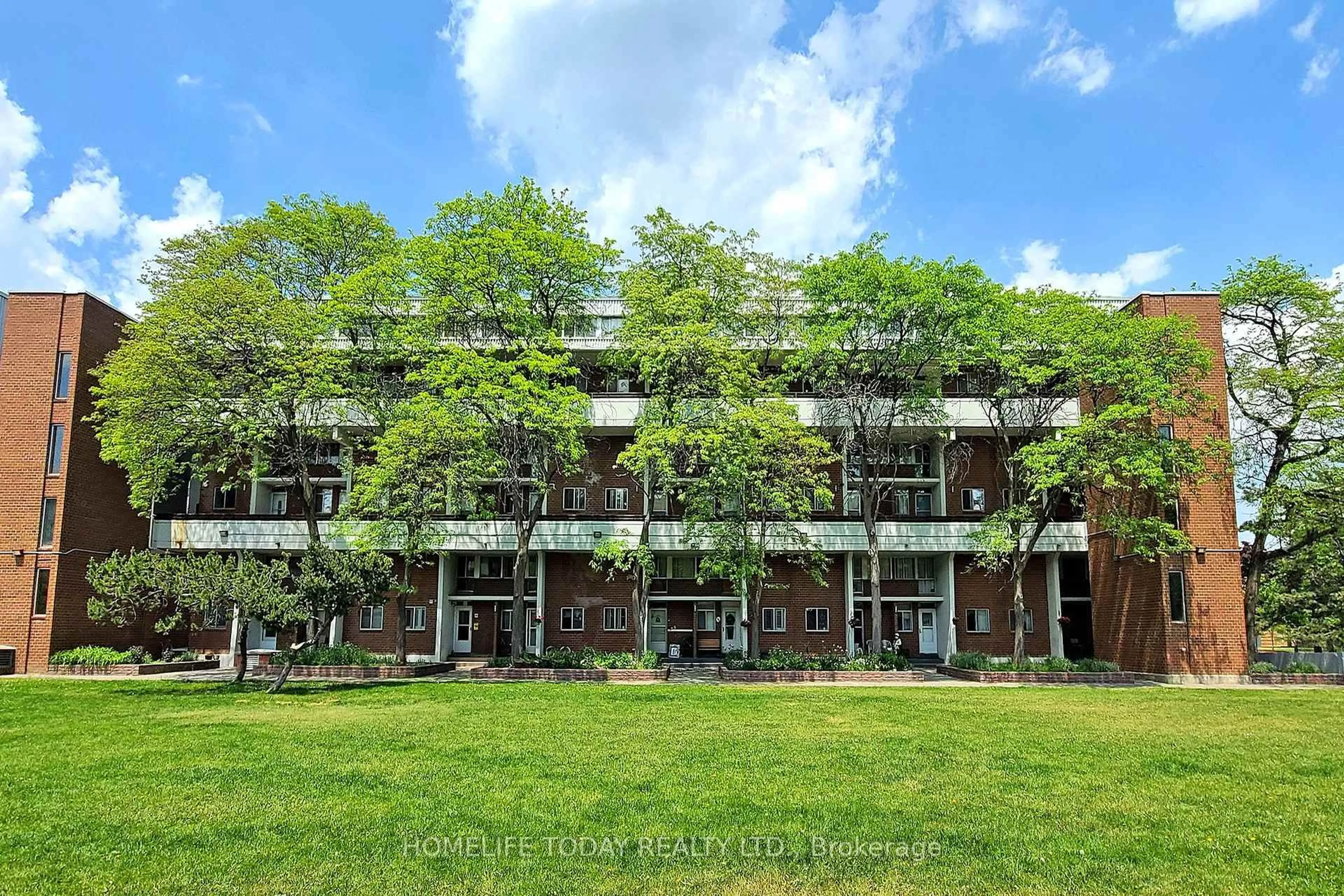 A pic from outside/outdoor area/front of a property/back of a property/a pic from drone, building for 155 Leeward Glwy #301, Toronto Ontario M3C 2Z6