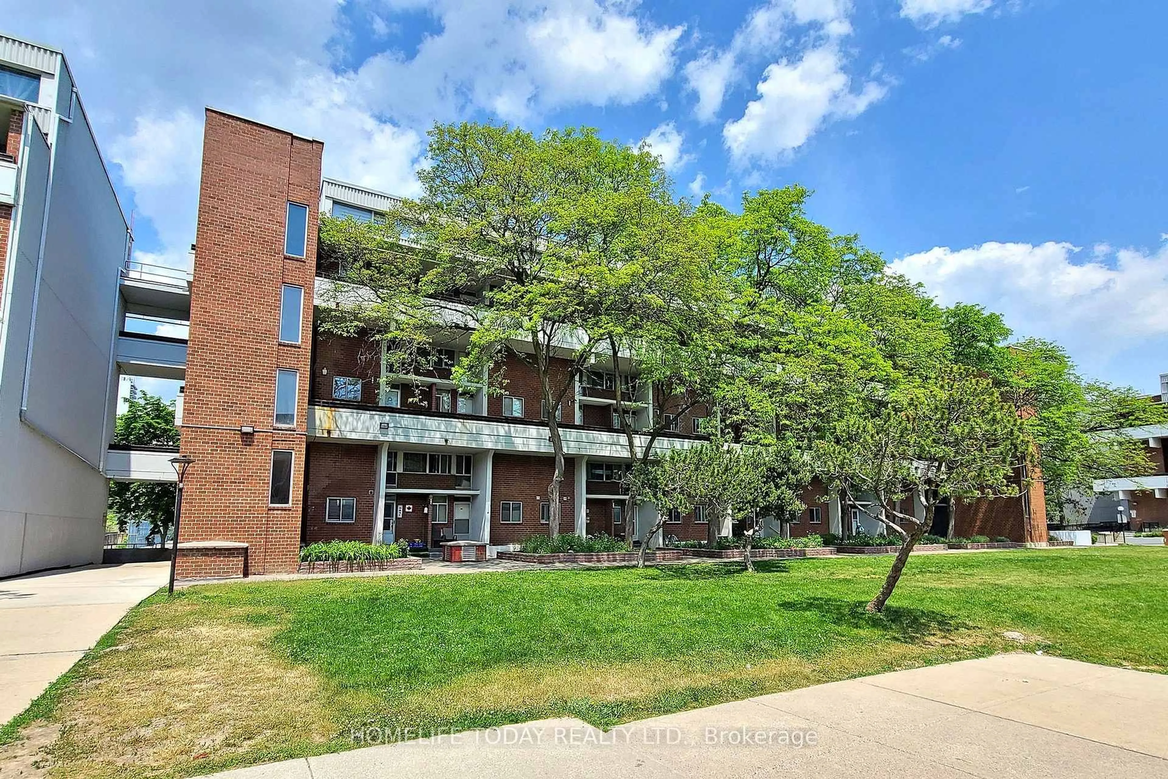 A pic from outside/outdoor area/front of a property/back of a property/a pic from drone, building for 155 Leeward Glwy #301, Toronto Ontario M3C 2Z6