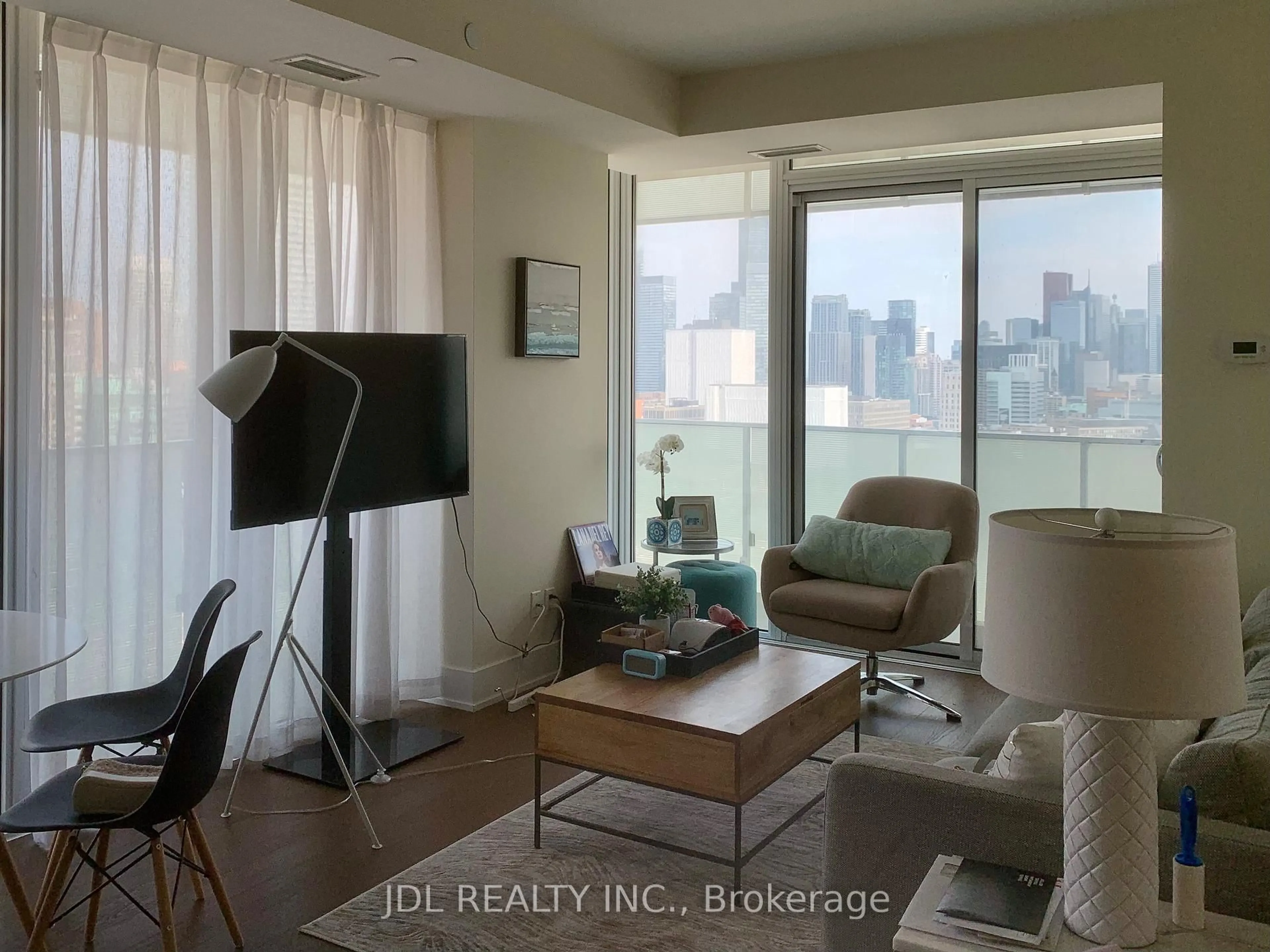 Living room with furniture, wood/laminate floor for 200 Bloor St #2204, Toronto Ontario M5S 1T8