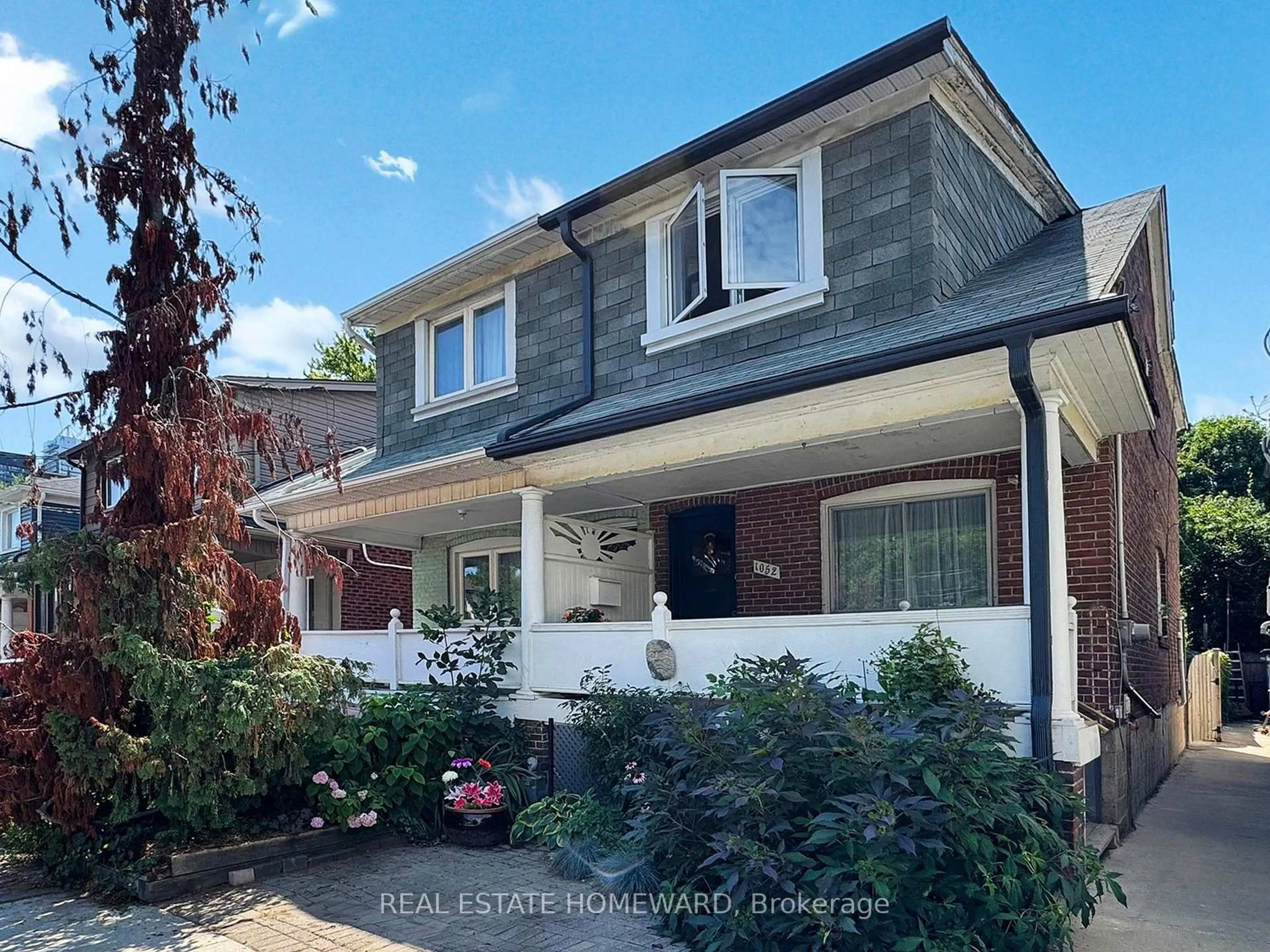 Home with brick exterior material, street for 1052 Mount Pleasant Rd, Toronto Ontario M4P 2M4
