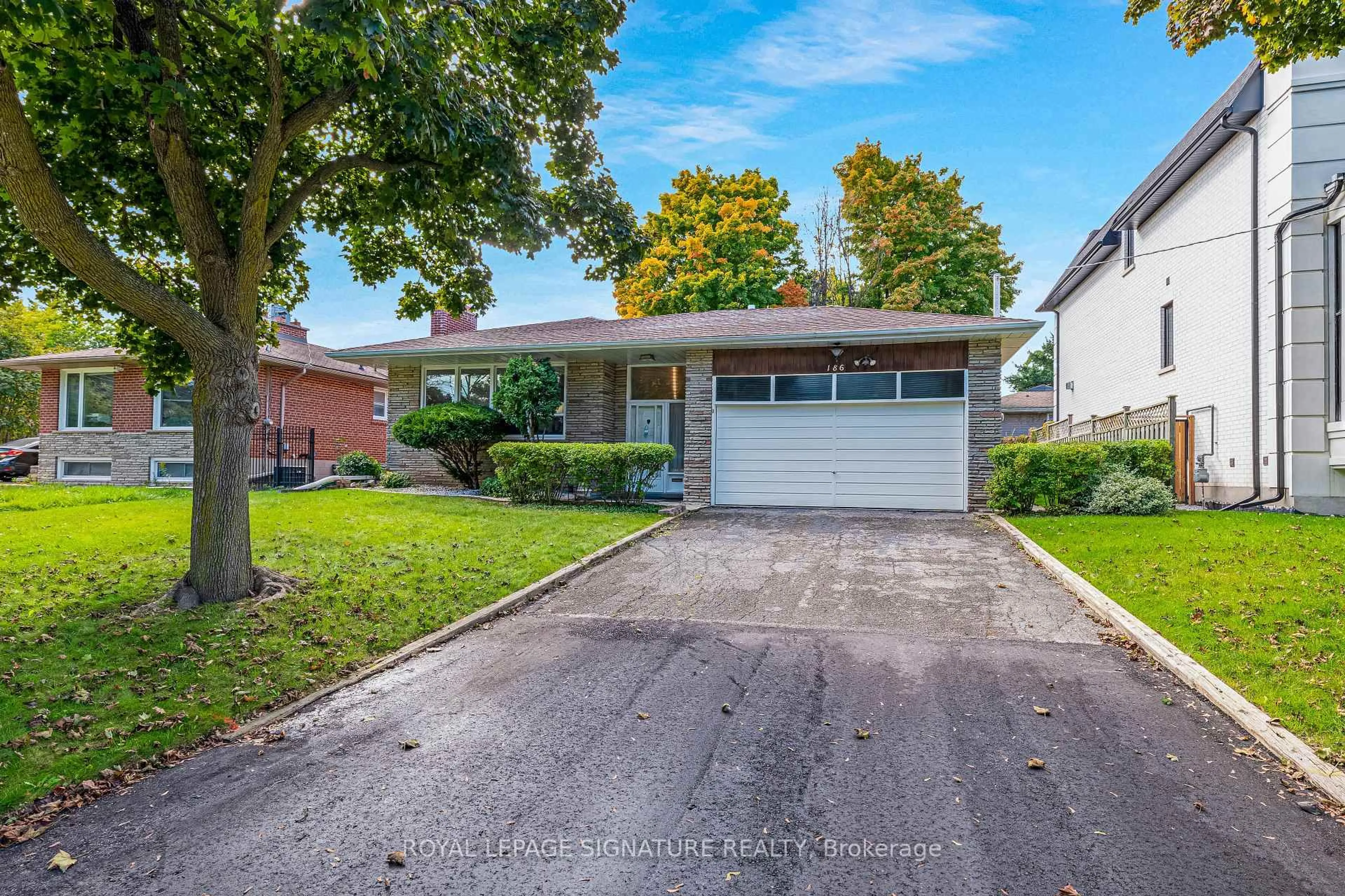 Home with brick exterior material, street for 186 Burbank Dr, Toronto Ontario M2K 1P4