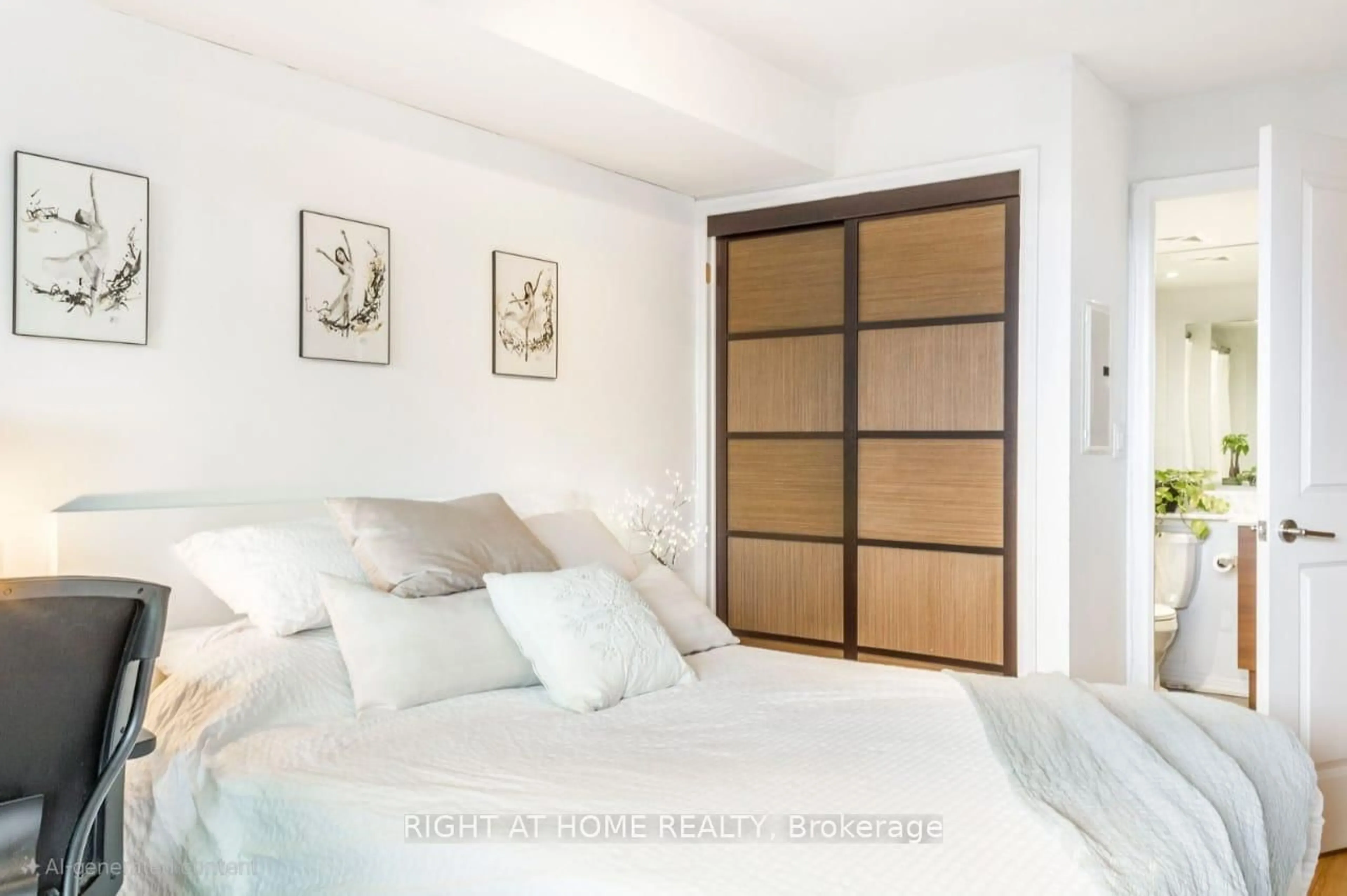 Bedroom with bed, wood/laminate floor for 125 Western Battery Rd #214, Toronto Ontario M6K 3R8