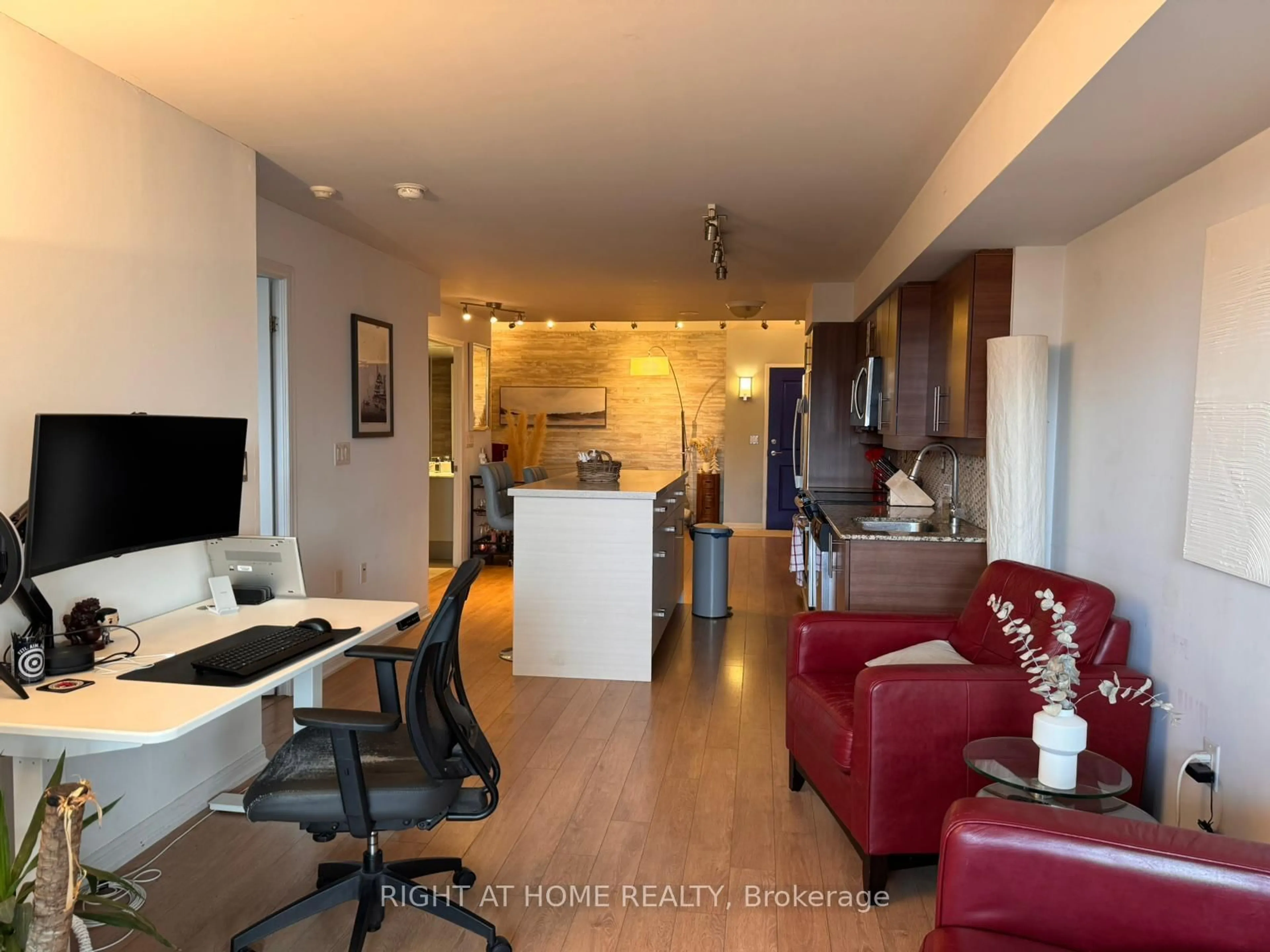 Open concept kitchen, wood/laminate floor for 125 Western Battery Rd #214, Toronto Ontario M6K 3R8