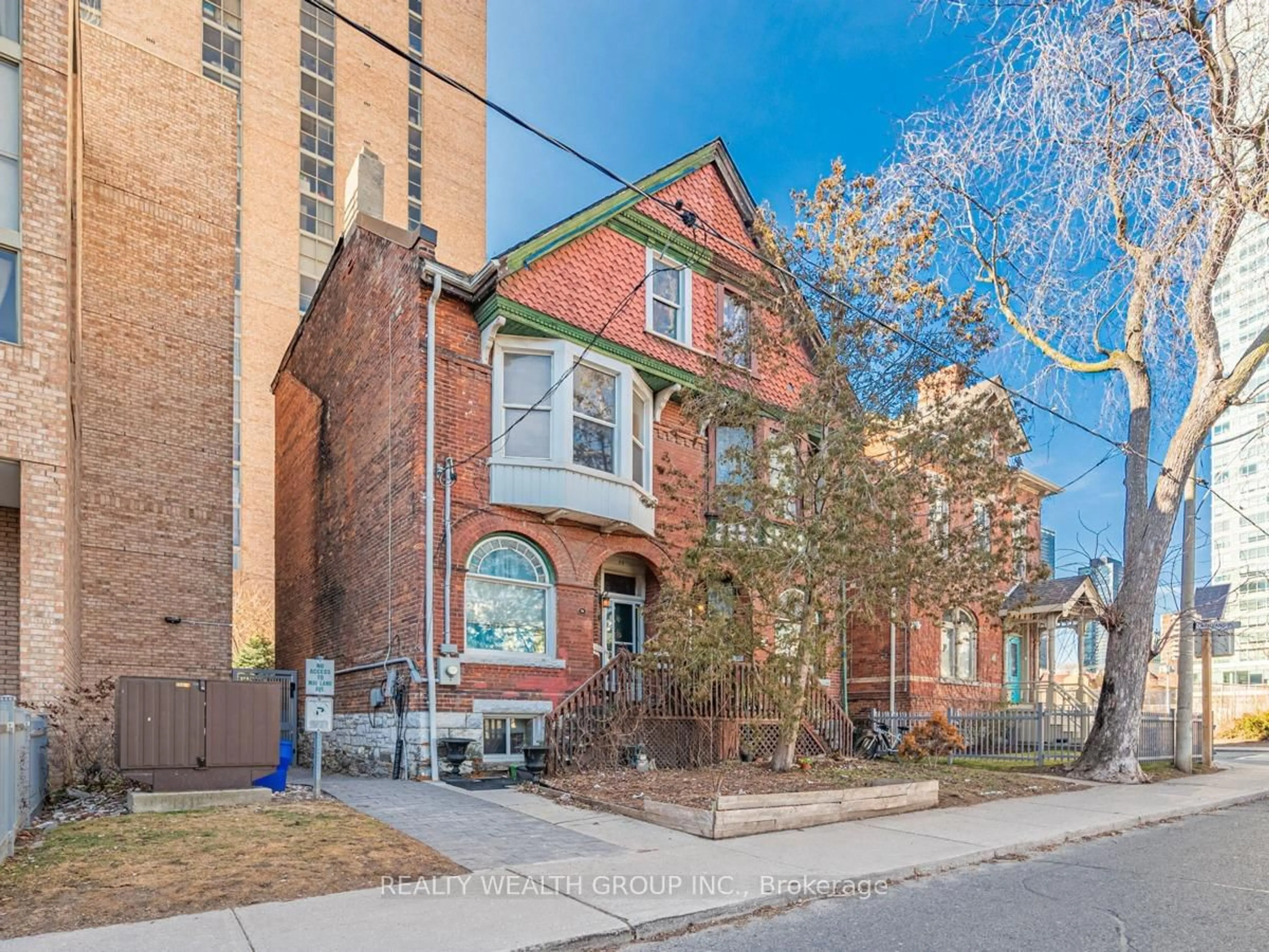 Home with brick exterior material, street for 74 Homewood Ave, Toronto Ontario M4Y 2K3