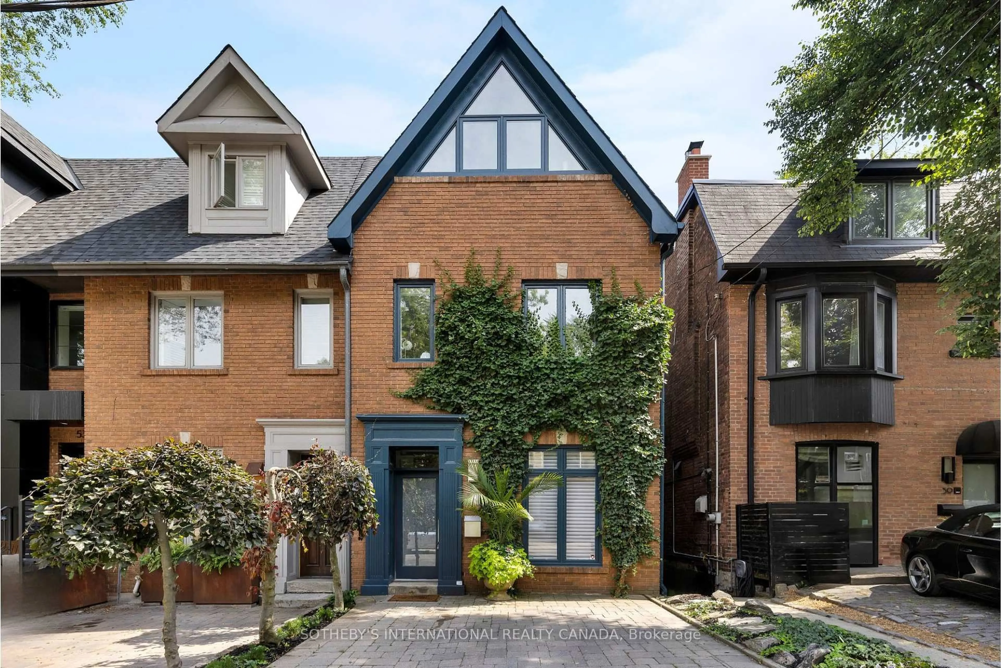 Home with brick exterior material, street for 57 Woodlawn Ave, Toronto Ontario M4V 1G6