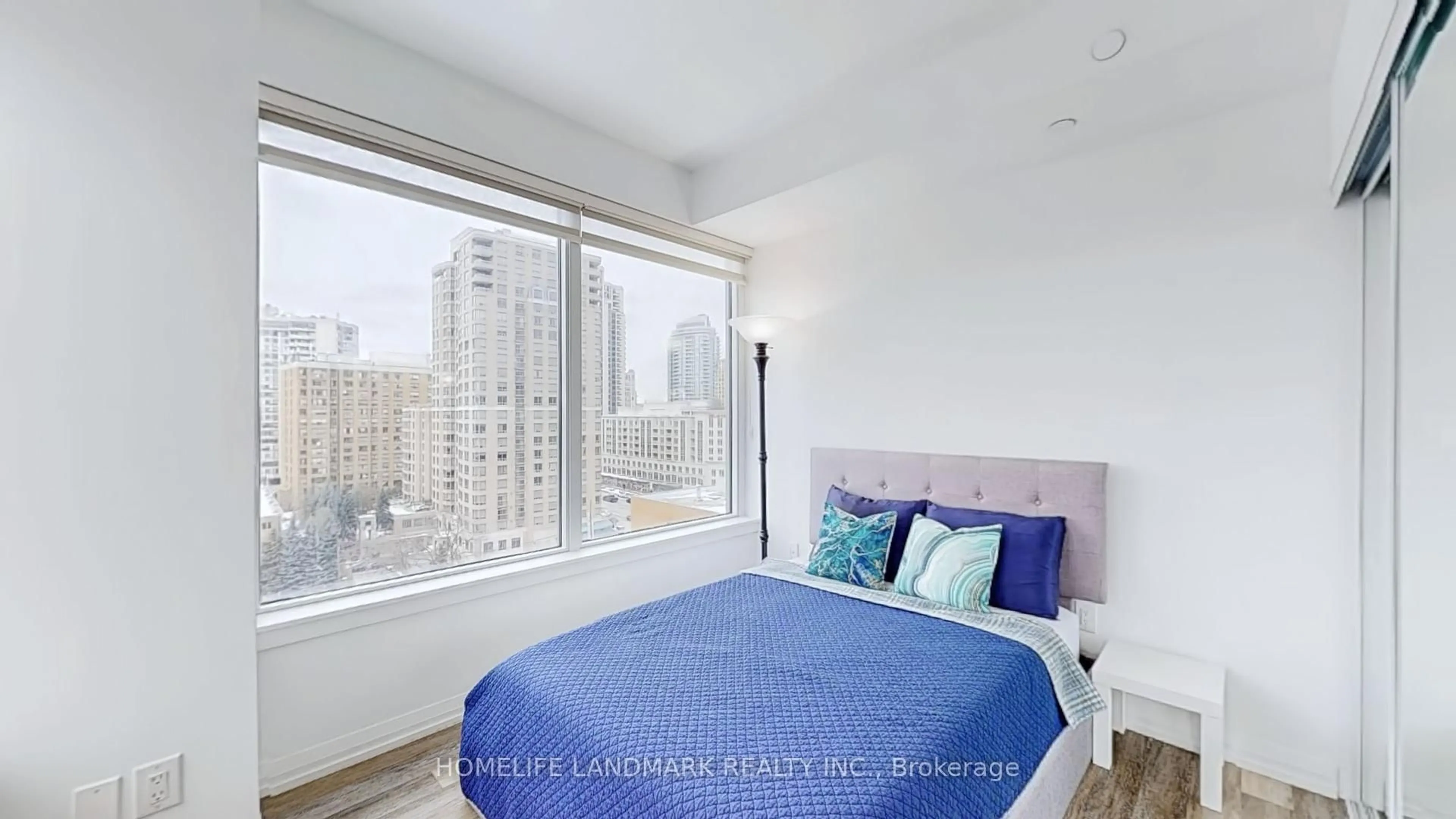 Bedroom with bed, wood/laminate floor for 75 Canterbury Pl #1211, Toronto Ontario M2N 0L2