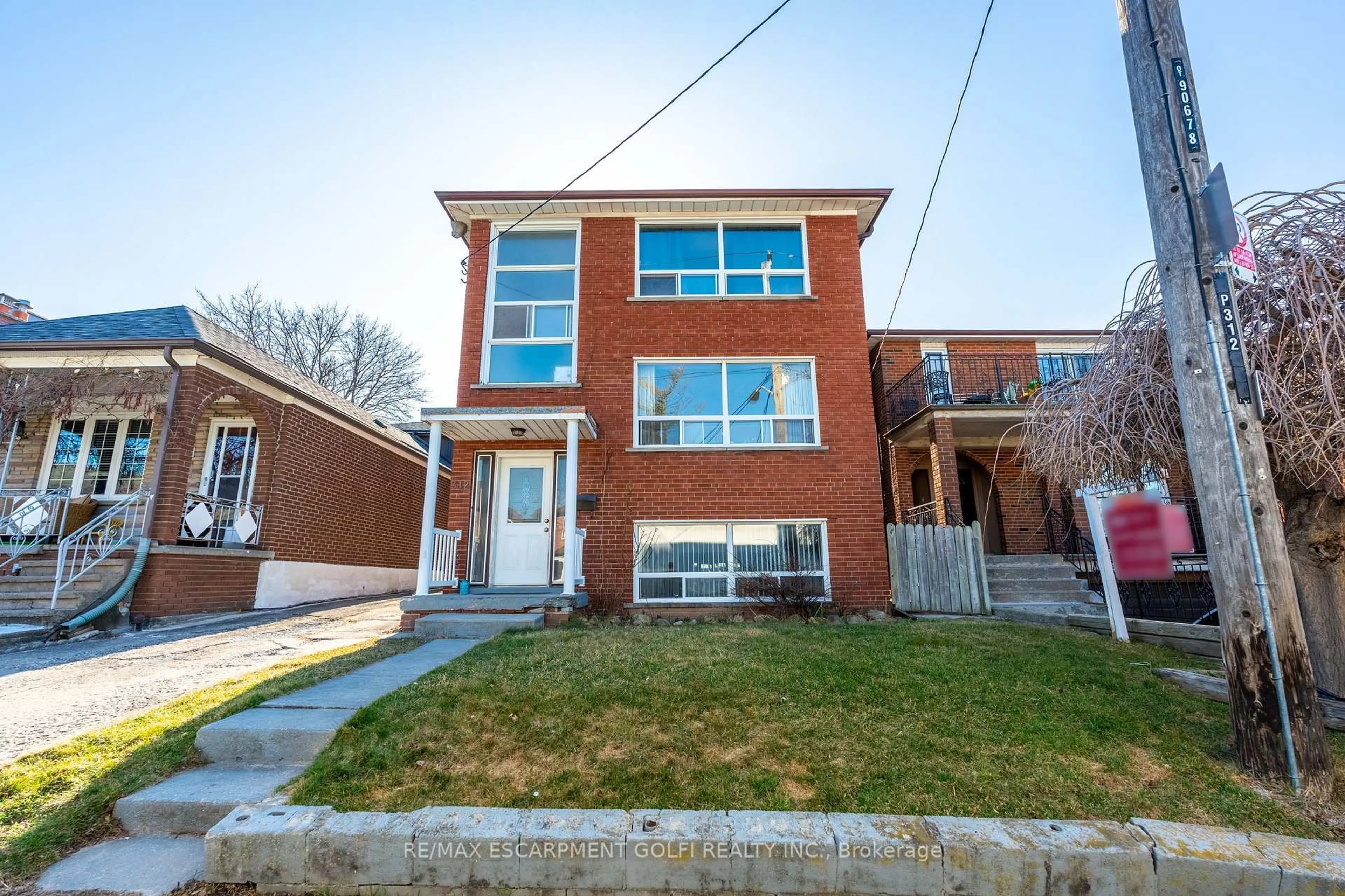 Home with brick exterior material, street for 312 ATLAS Ave, Toronto Ontario M6C 3P9