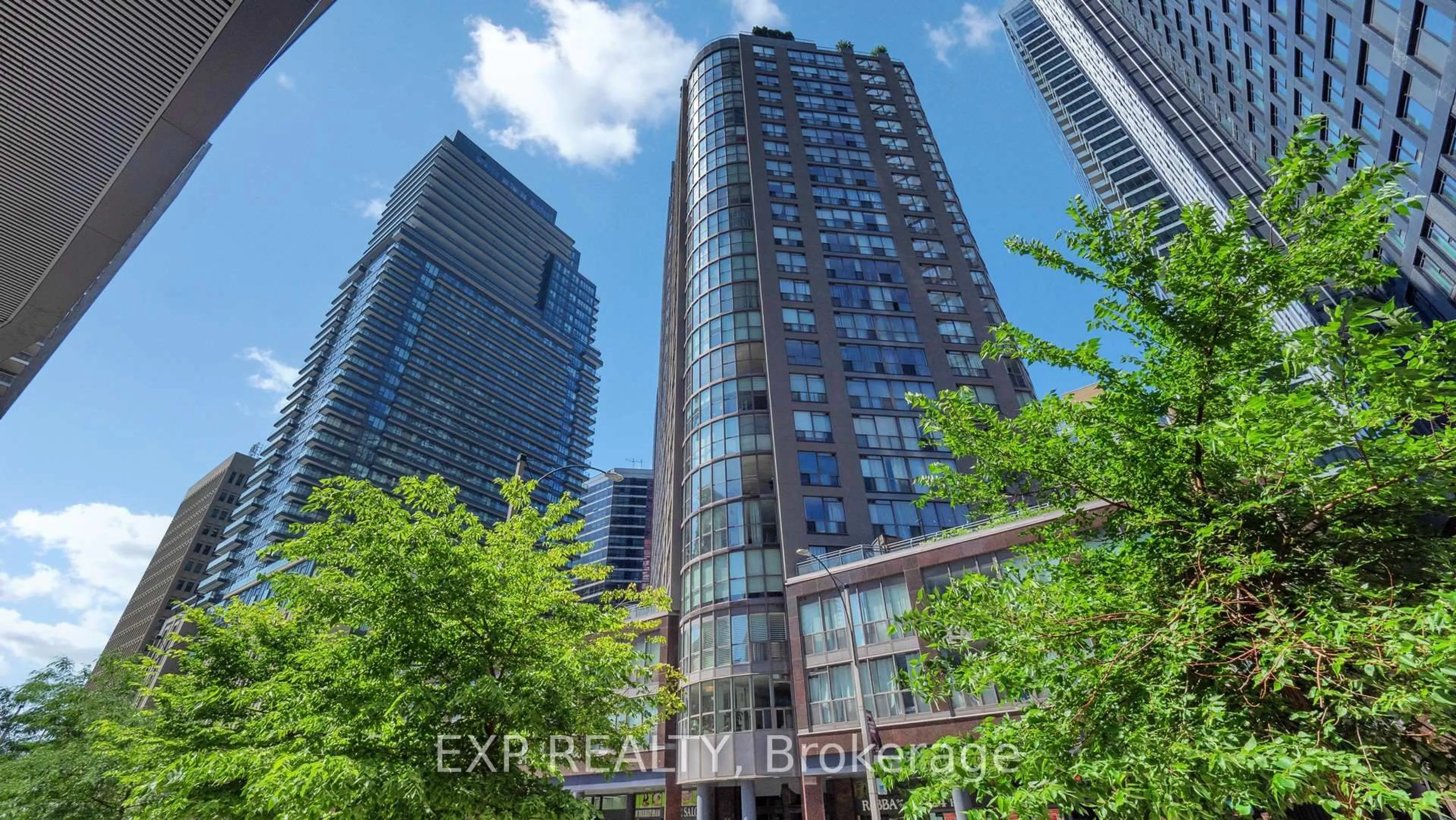 A pic from outside/outdoor area/front of a property/back of a property/a pic from drone, city buildings view from balcony for 24 Wellesley St #1105, Toronto Ontario M4Y 2X6